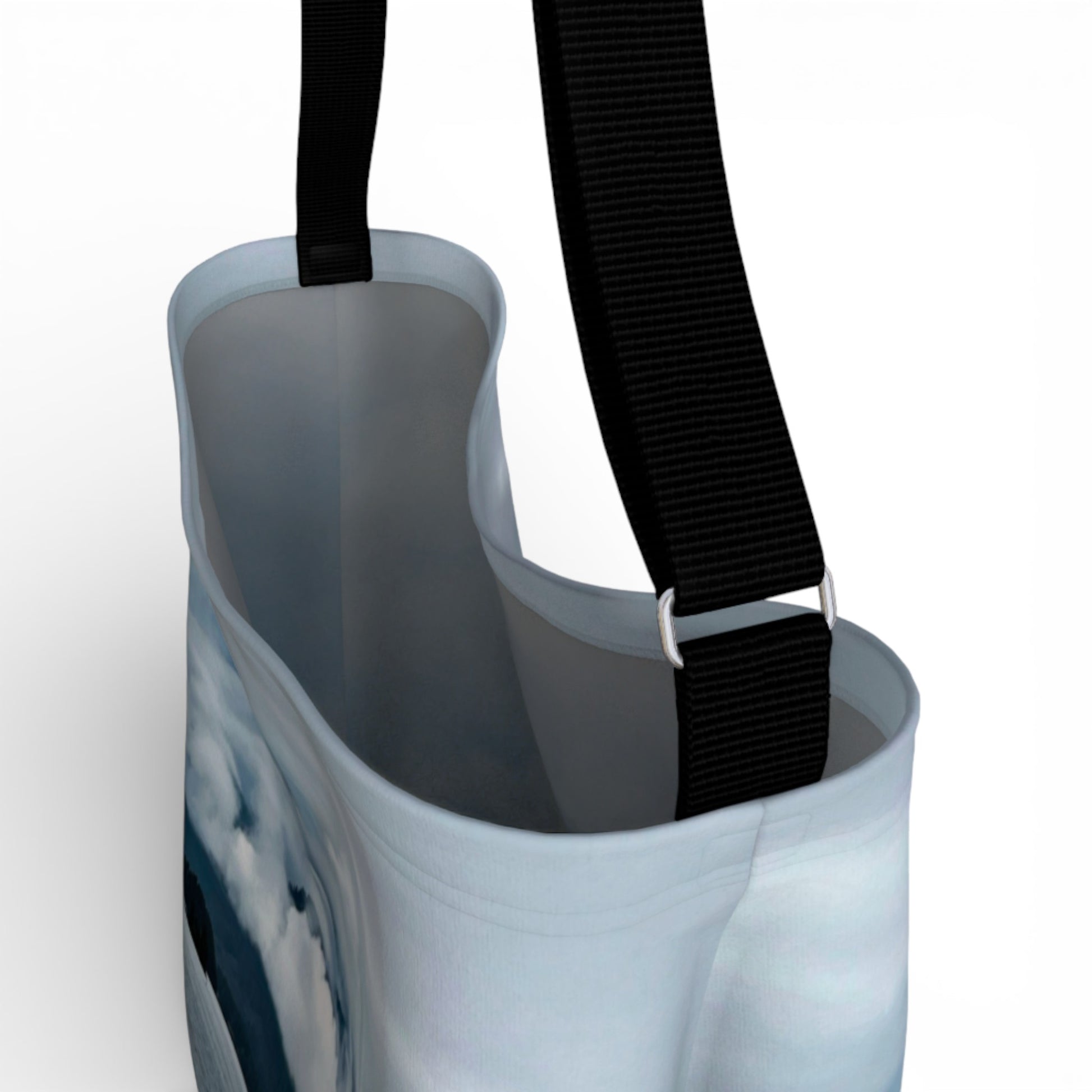 Gray bag with a black strap on a white background
