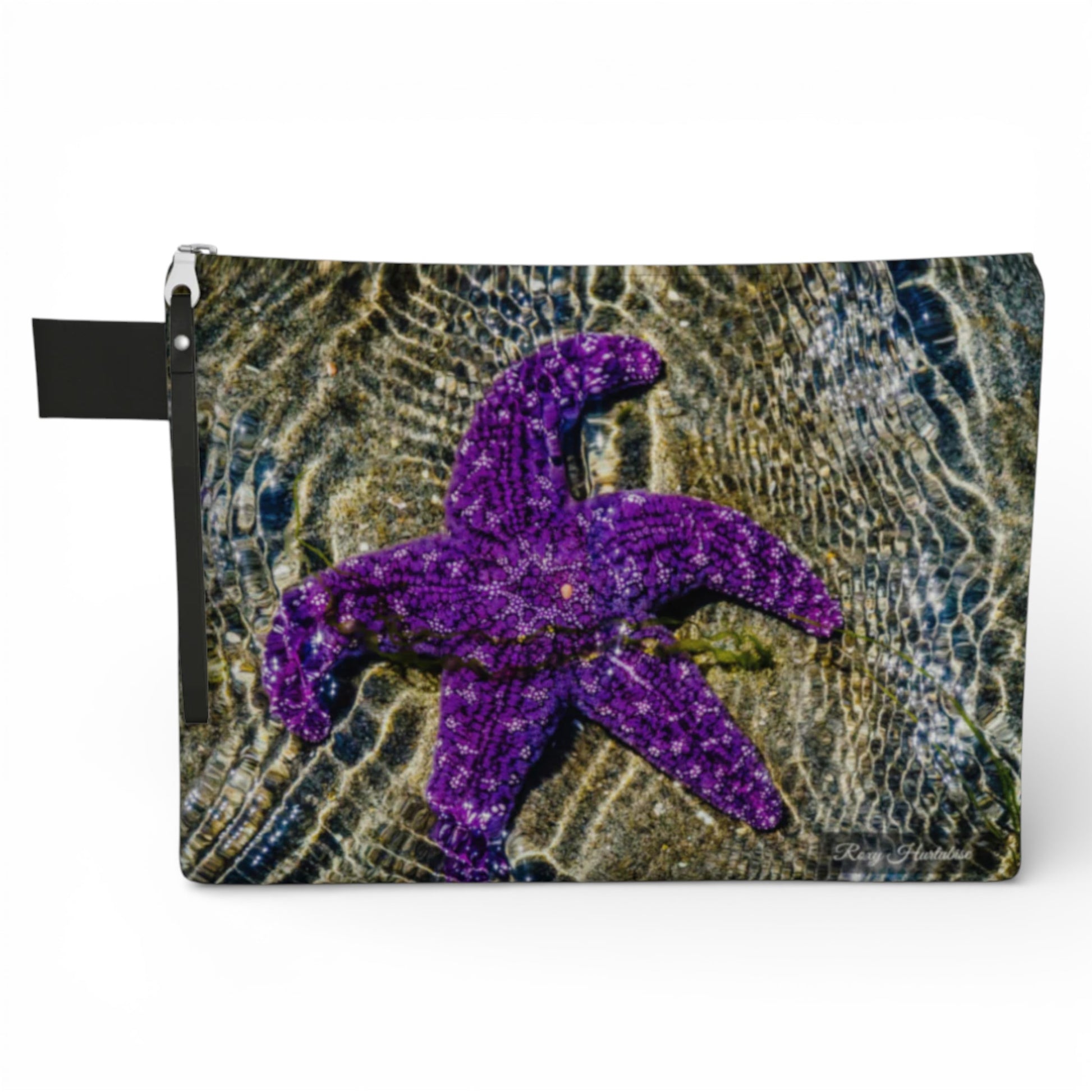 Pouch with a purple starfish design on a textured background