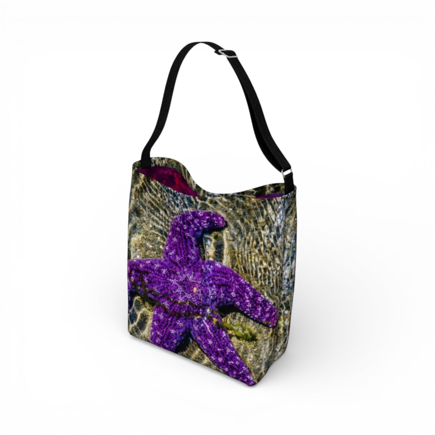 Handbag with a purple starfish design on a white background