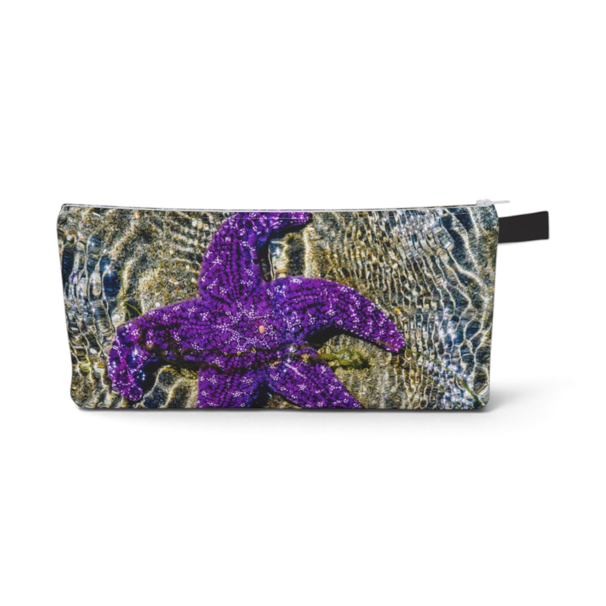 A rectangular zippered pouch featuring a glittery purple starfish design over a textured underwater wave pattern, with a small black pull tab on the right side.
