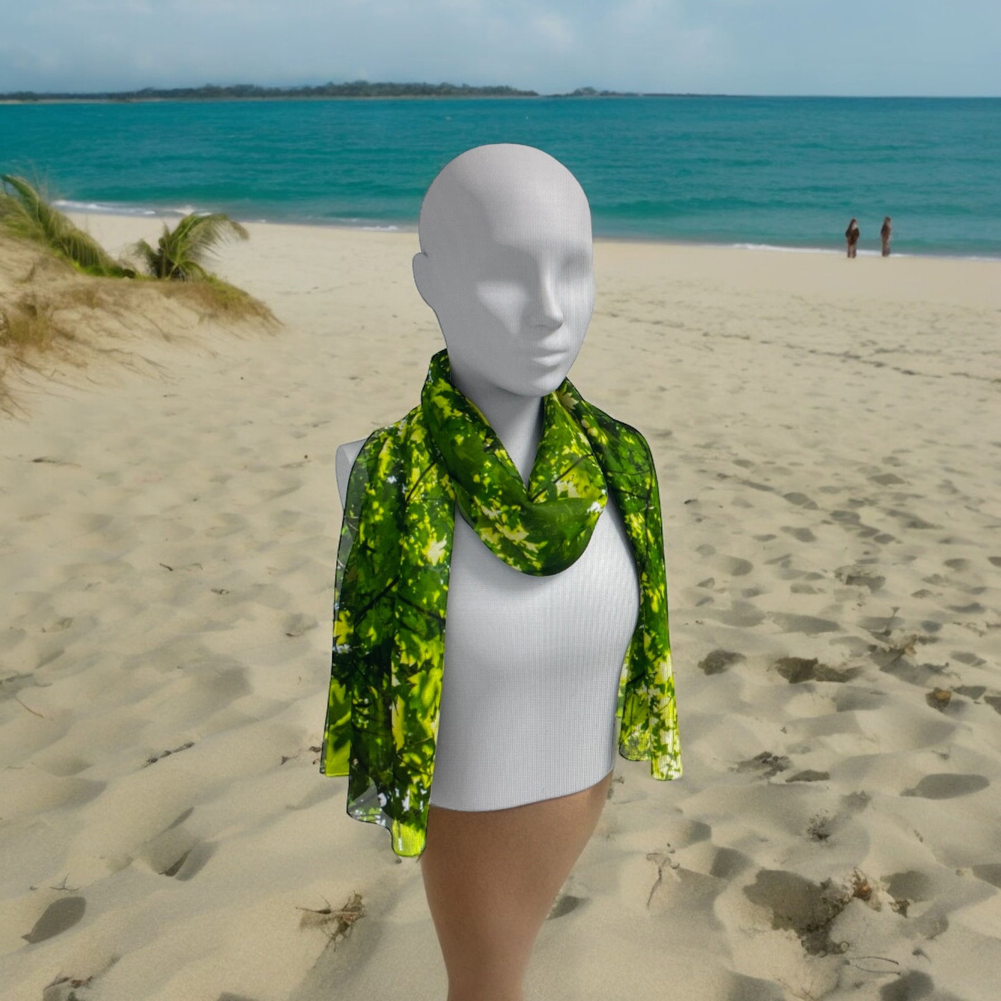 Canopy of Leave worn around the neck on a person walking the beach.