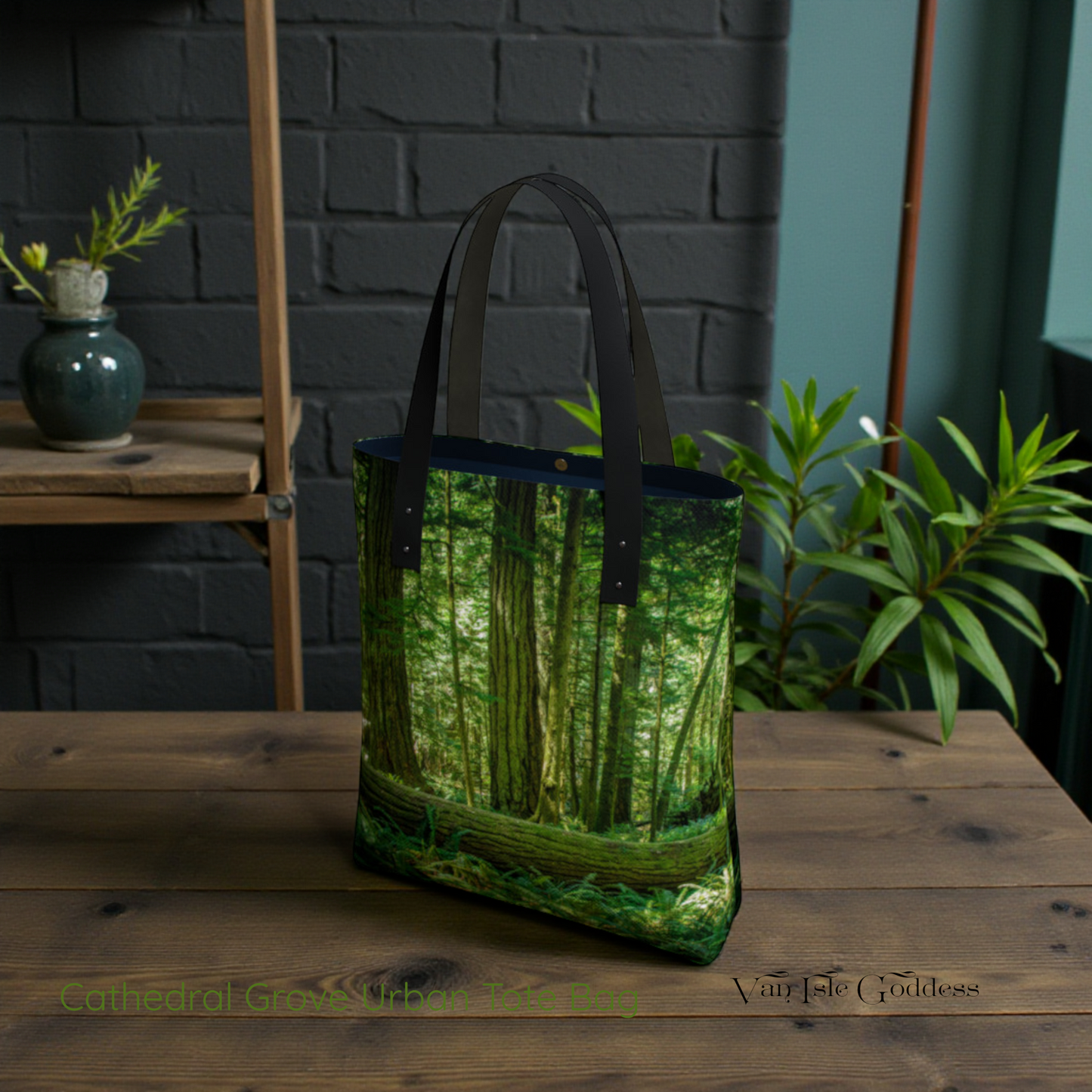 Tote bag with forest design on a wooden table against a brick wall.