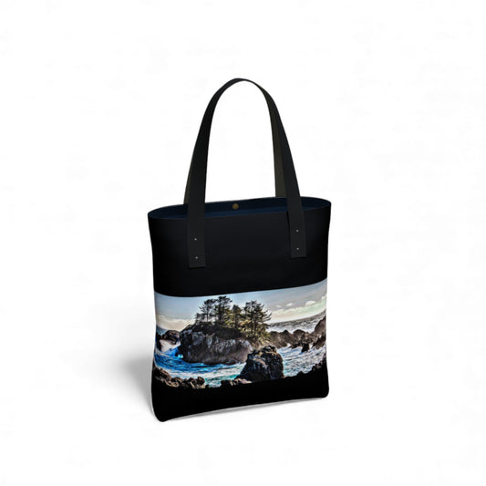 Tote bag with a scenic design of rugged west coast  on a white background