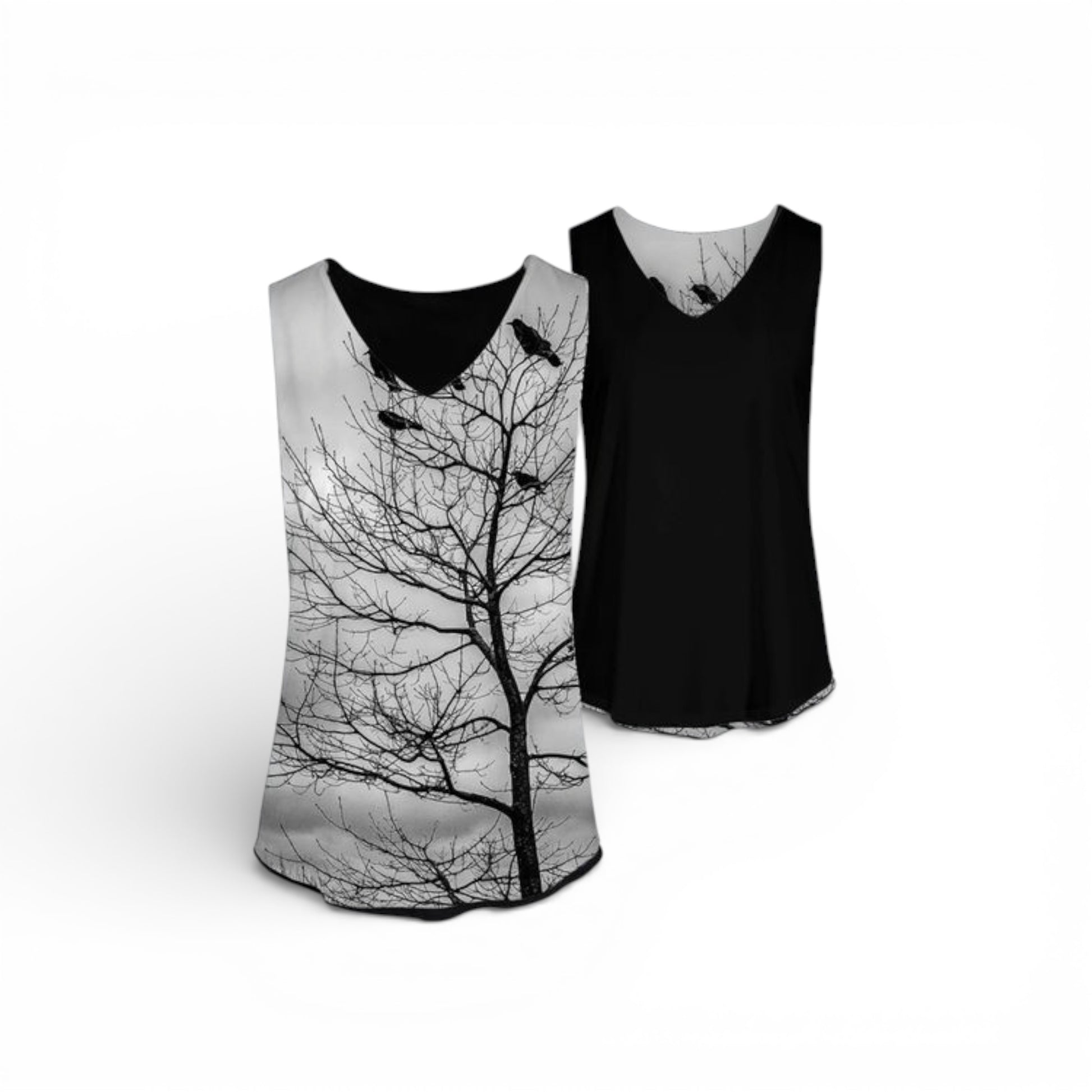 Two tank tops with tree and bird design on a white background