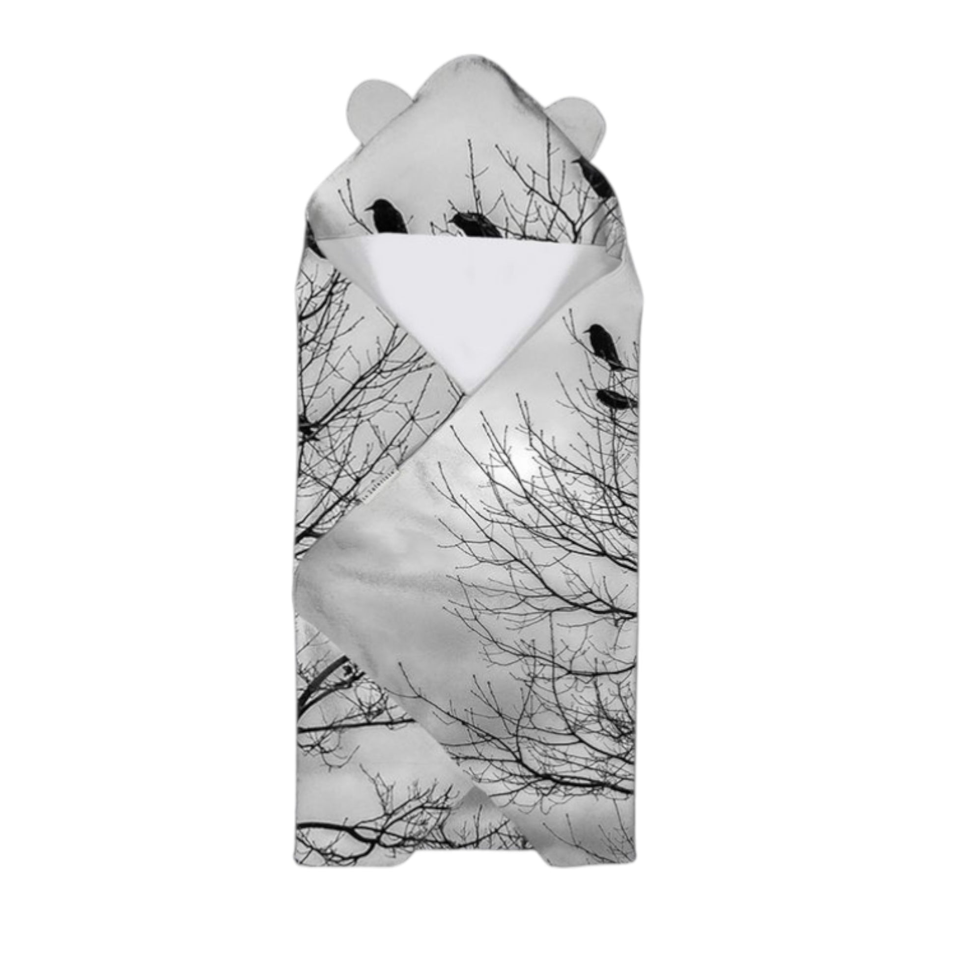 Baby swaddle with tree and bird design on a white background