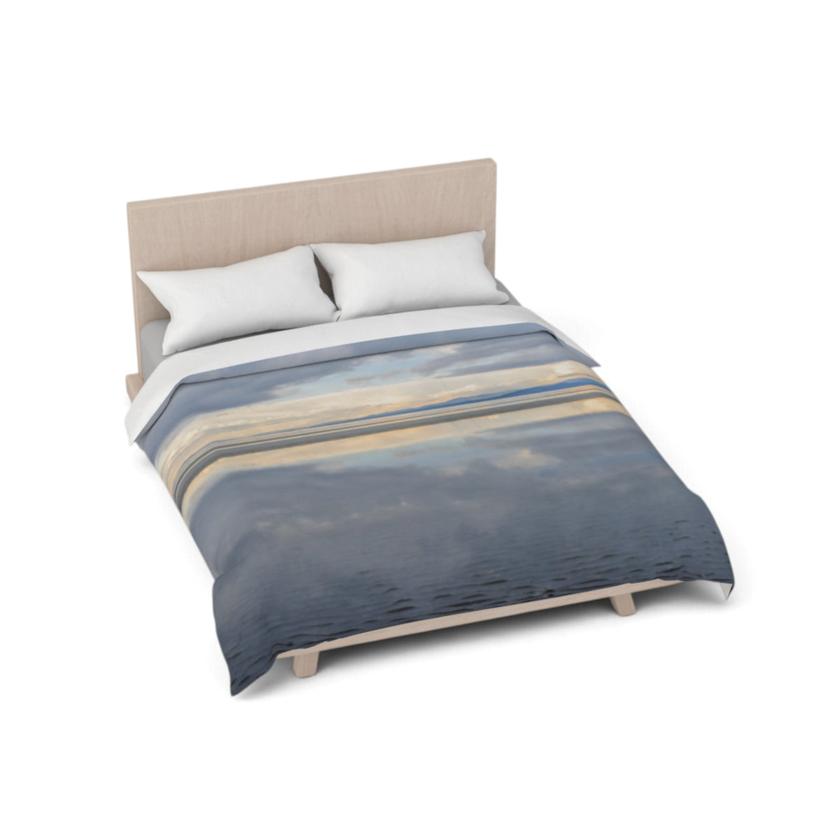A bed with a light wood frame and white pillows, dressed in a duvet cover featuring an abstract landscape print in shades of blue, beige, and gray, shown on a plain white background.