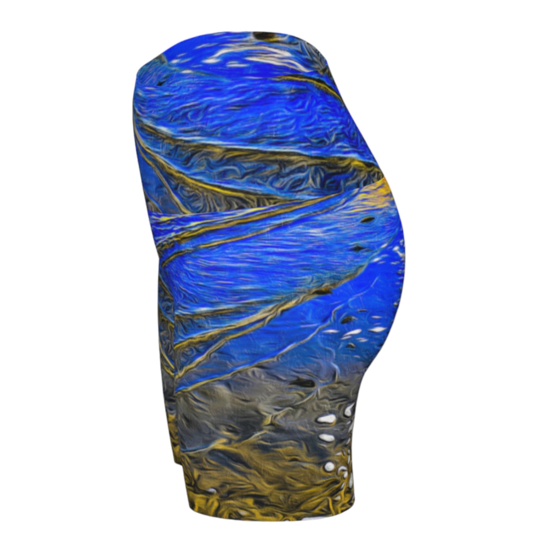 Left side. Ebb and Flow All over print yoga shorts.  The shorts feature a image of the ocean water at low tide on Parksville Beach.  the blue sky and the sun is reflecting on the water as the waves gently ripple across the sand.  A painterly effect was added to create a artistic effect.