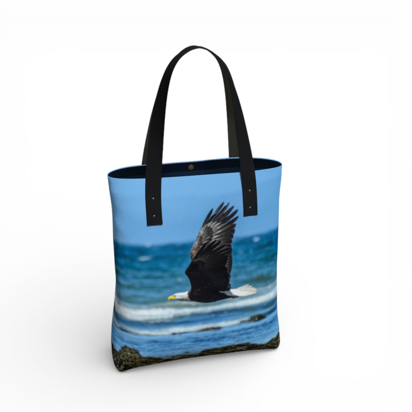 Tote bag with an eagle design on a blue background
