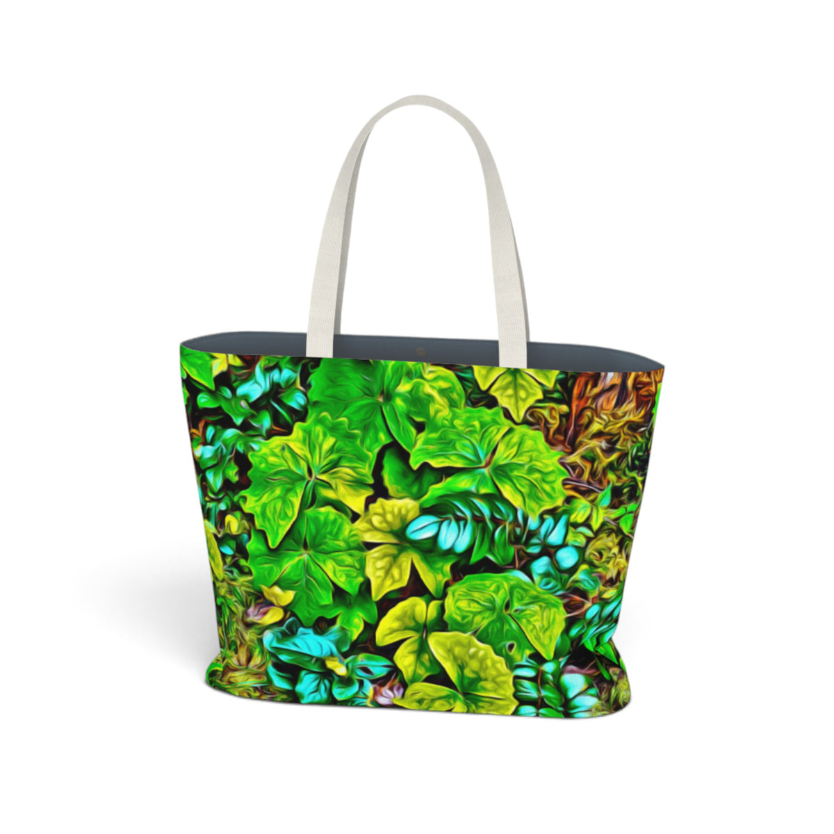 A tote bag with a vibrant green and yellow leafy pattern, featuring off-white shoulder straps and a dark navy blue interior, shown on a plain white background.