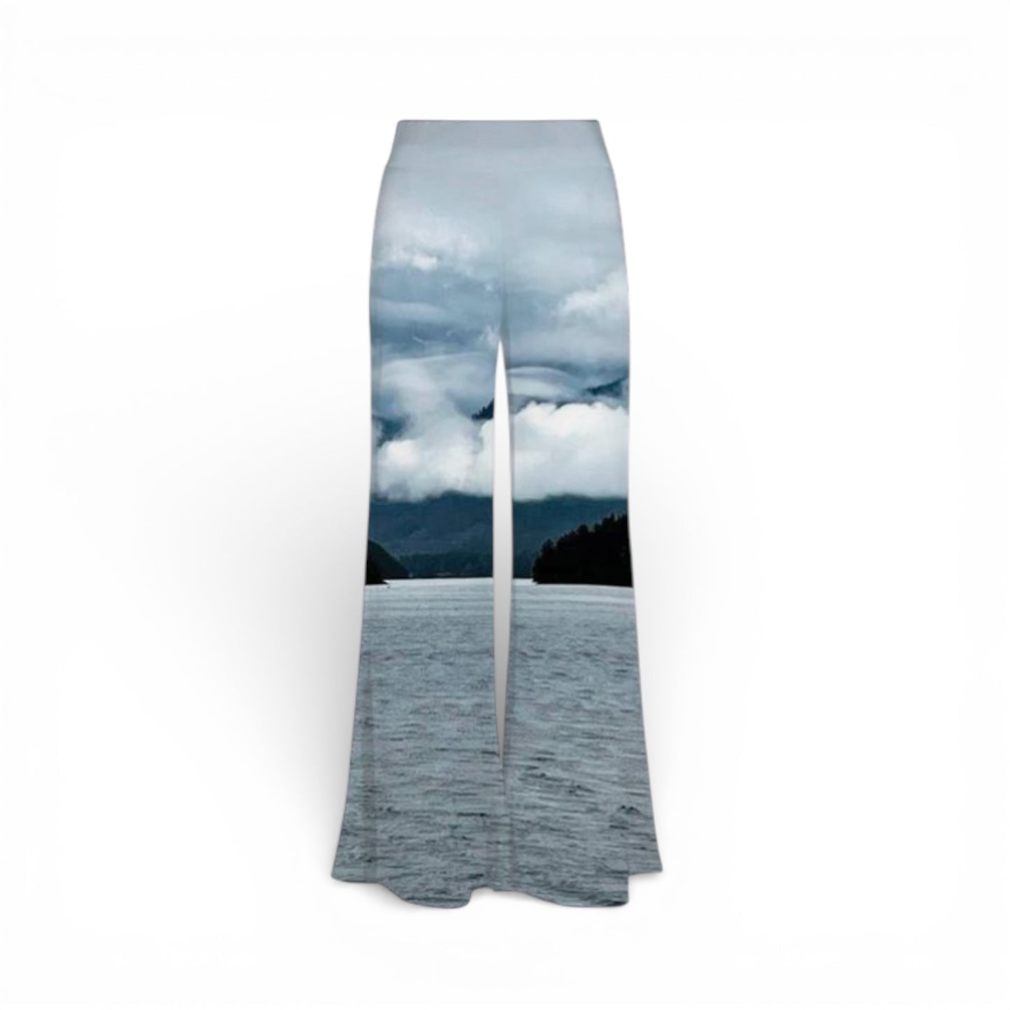 Flared pants with a scenic print of a lake and mountains on a white background