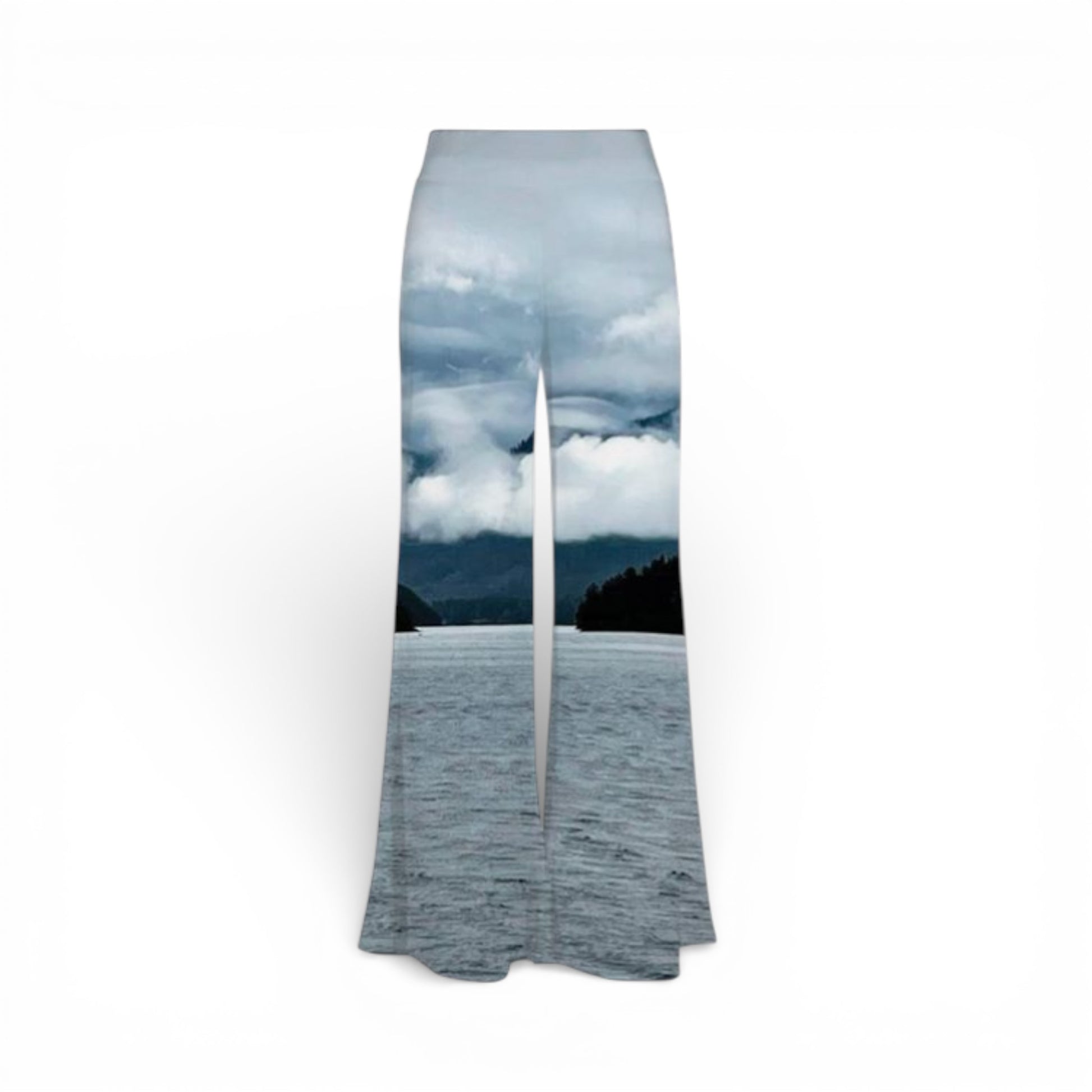 Flared pants with a scenic print of a lake and mountains on a white background