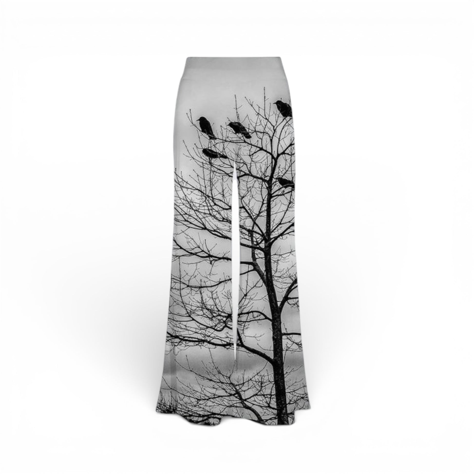 Flared pants with a tree and bird design on a white background