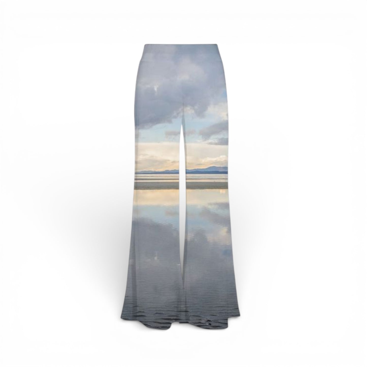 Palazzo pants with a scenic print of a mountain and sky on a white background