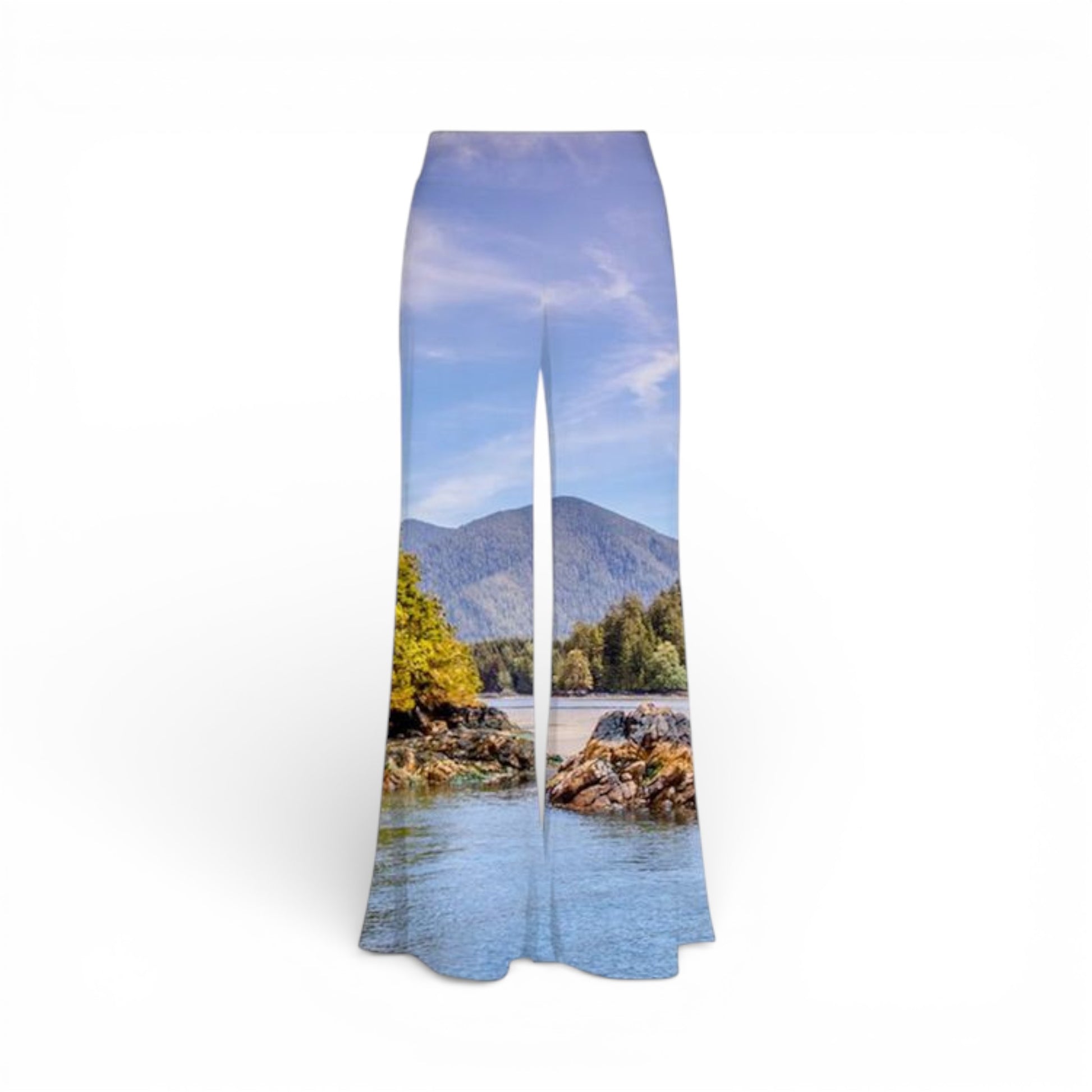 Pants with a scenic print of a lake and mountains on a white background