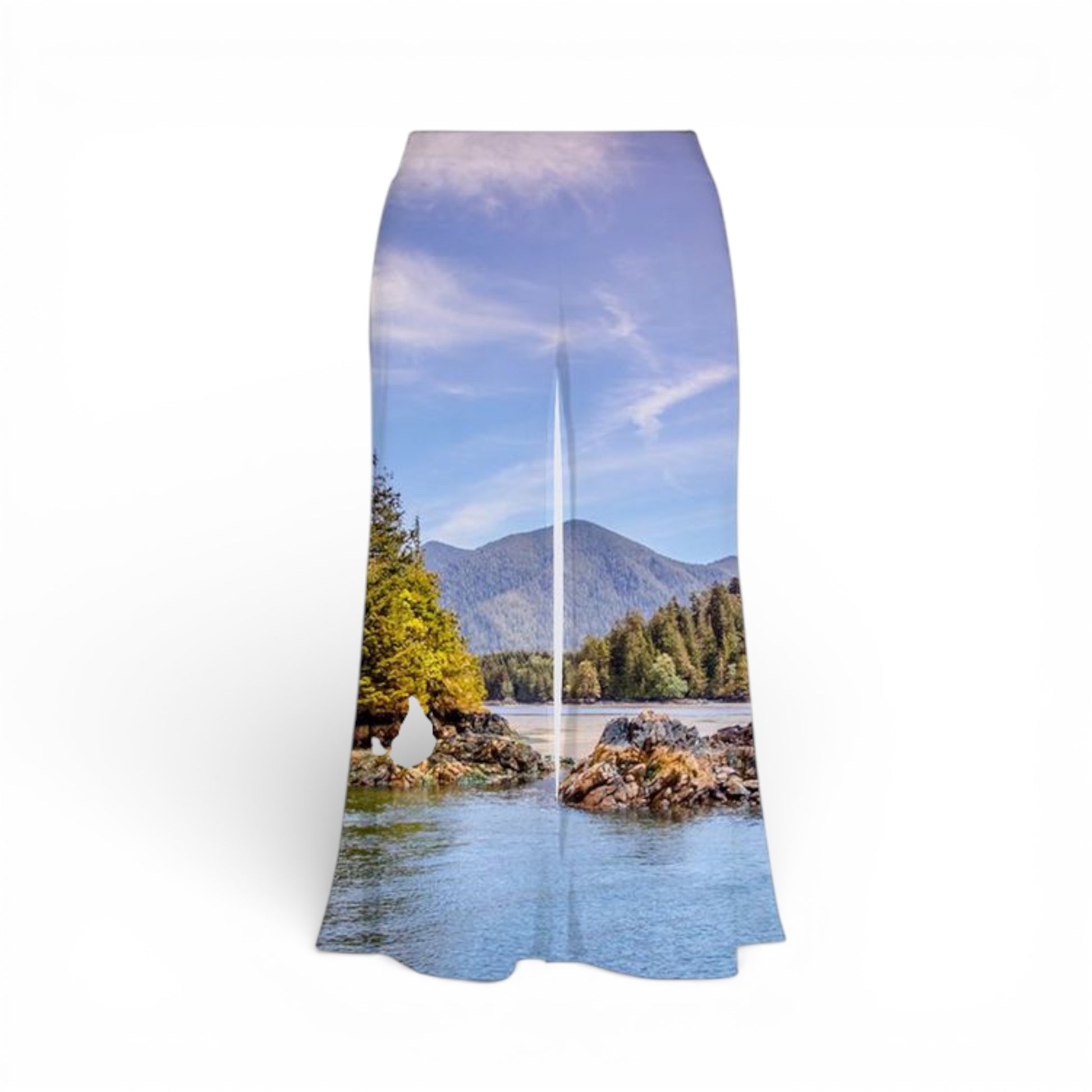 Pants with a scenic print of a lake and mountains on a white background