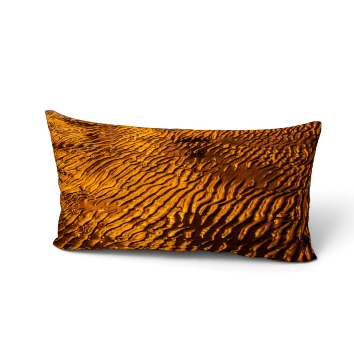 A rectangular lumbar pillow featuring a detailed print of golden-brown desert sand dunes with rippled textures, shown on a clean white background.
