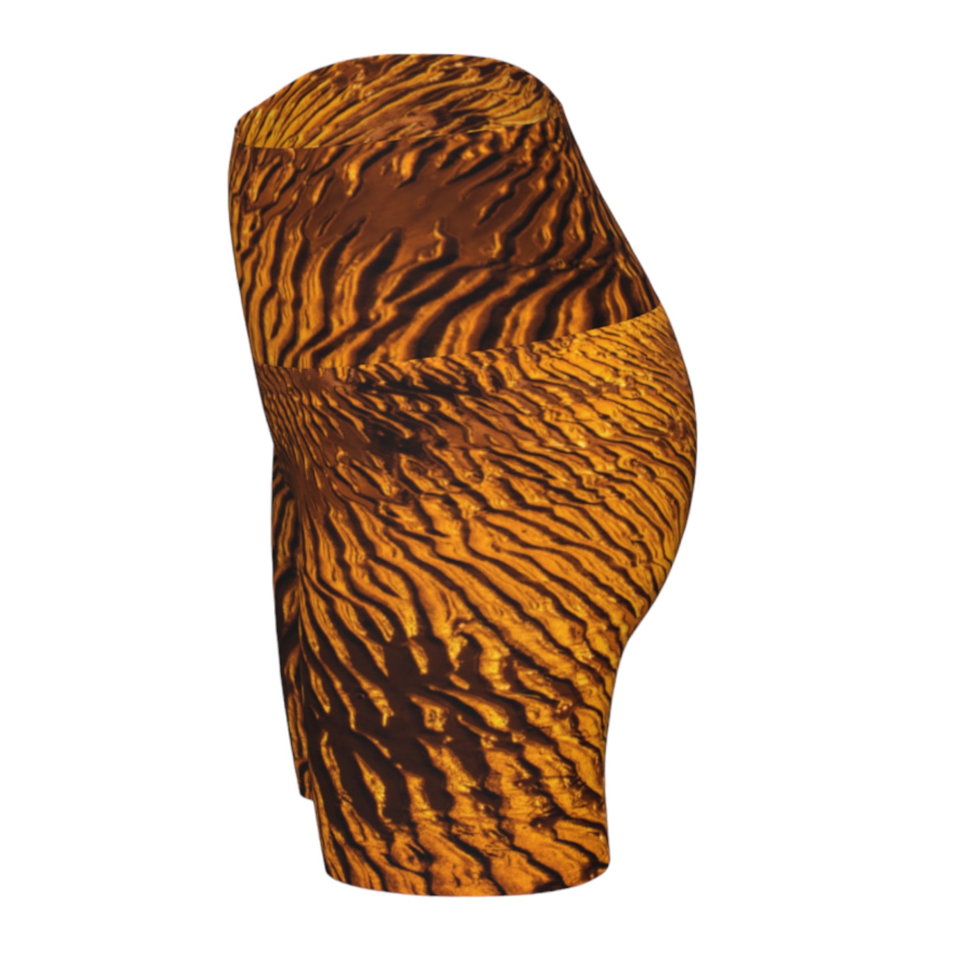Golden Sand yoga shorts feature a image of the sand at low tide as the sun is setting it casts a golden hue across the beach. This image is printed all over the shorts.