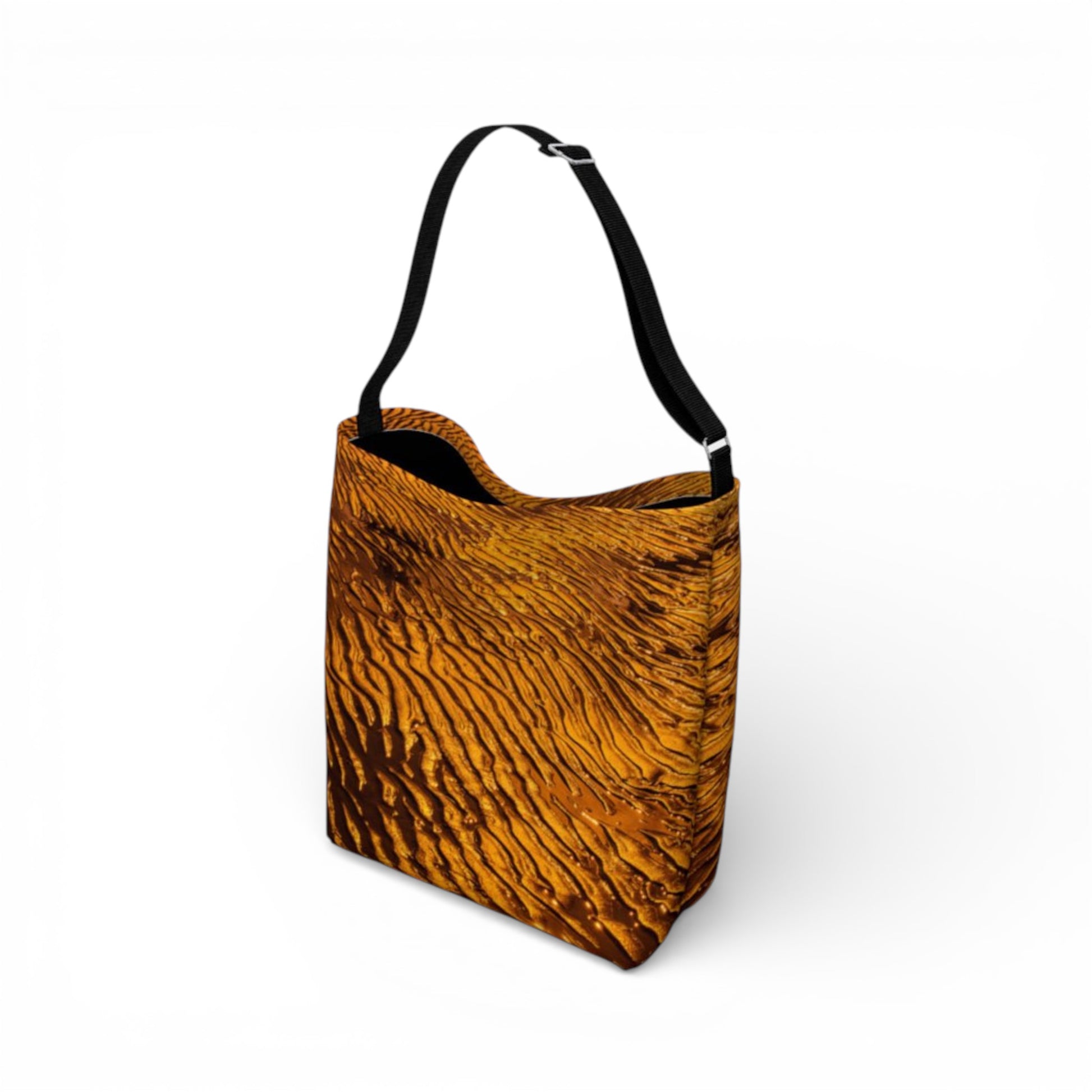 Brown textured bag with a black strap on a white background