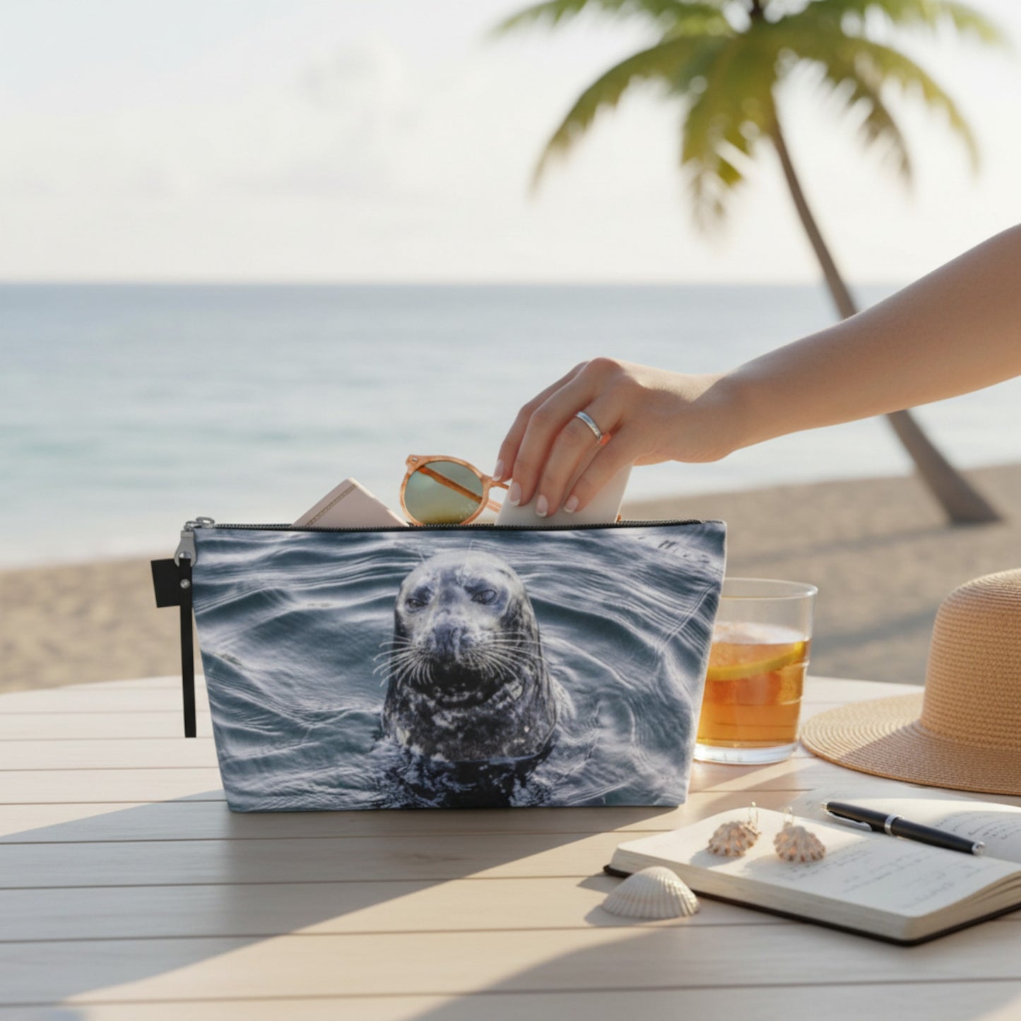Pouch with a seal design on a table by the beach