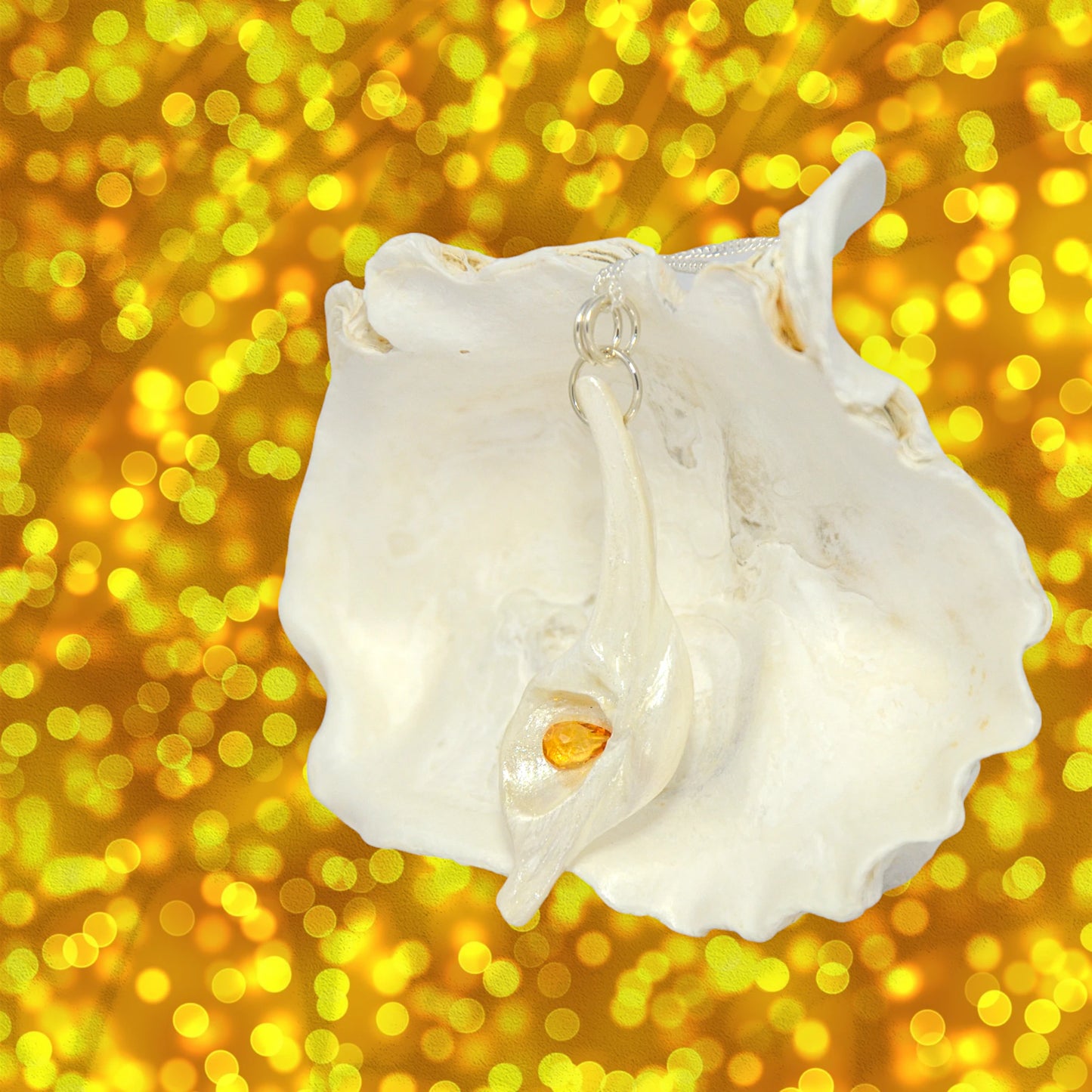 Sun Star natural seashell pendant with a beautiful pear shaped rose cut Citrine.