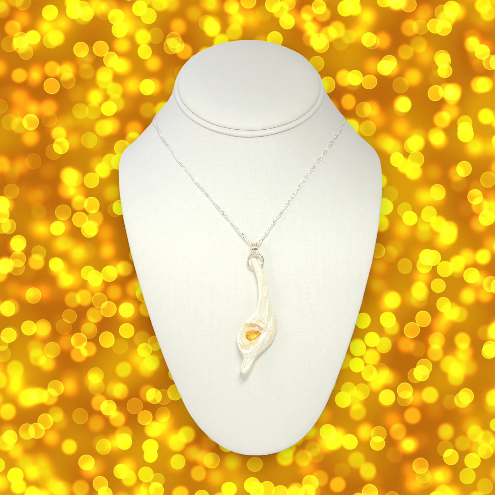 Sun Star natural seashell pendant with a beautiful pear shaped rose cut Citrine.