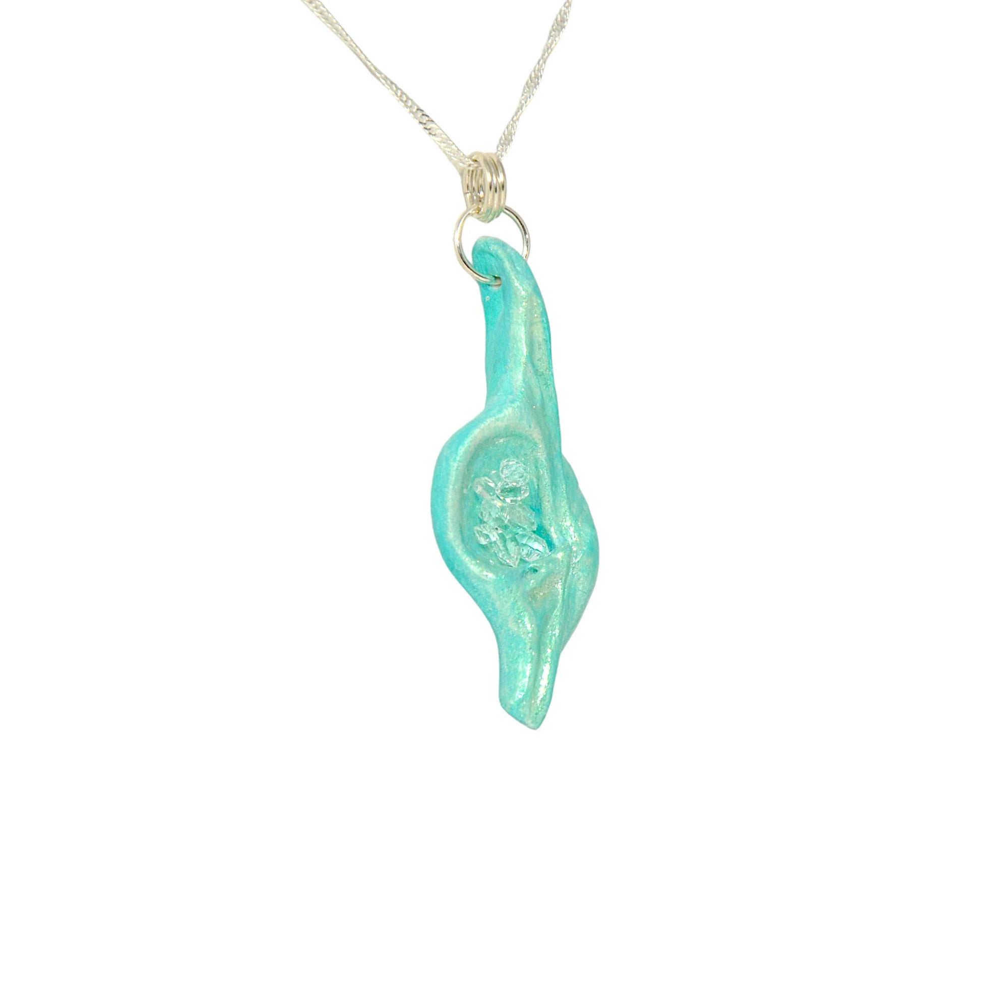 Diamond Mine Pendant is named for the eight herkimer diamonds that enhance the beauty of this gorgeous pendant!  The pendant is turned to show the viewer this side of the pendant.