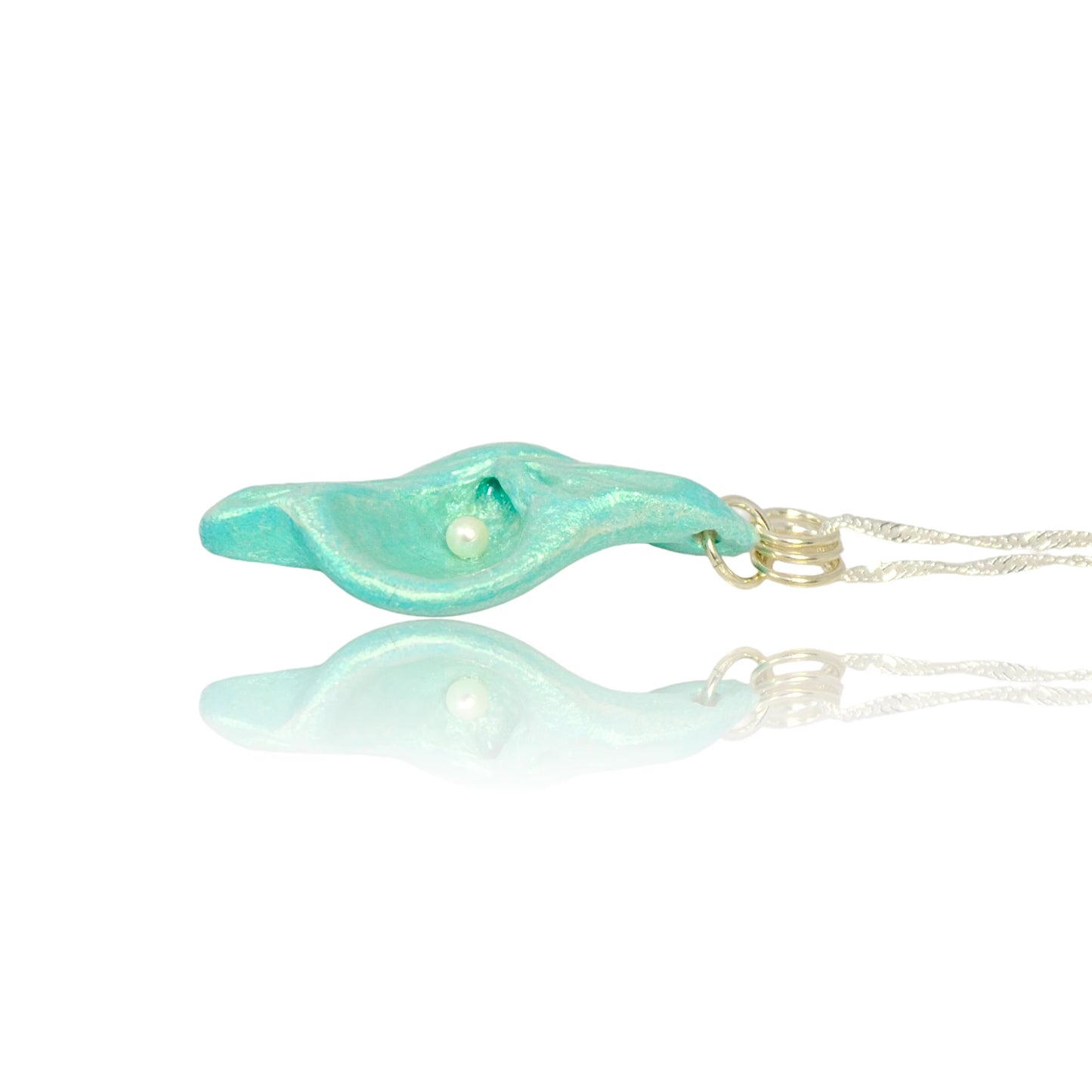 Ocean Pearl natural seashell pendant has a  real freshwater baby pearl. 