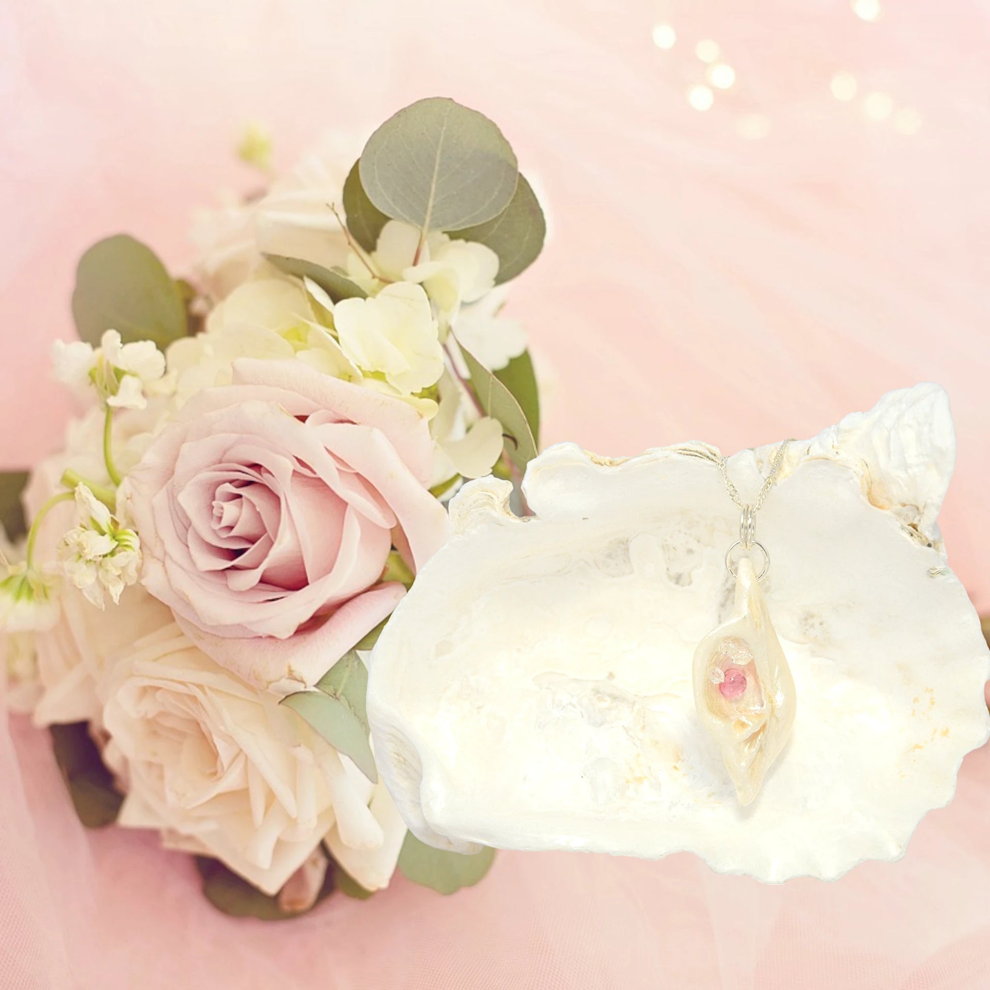 This natural seashell pendant has Pink Tourmaline gemstone and three Herkimer Diamonds that compliments the pendant.