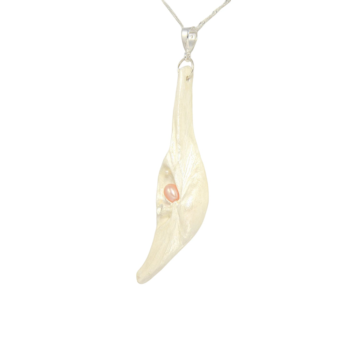Nefertiti natural seashell and a real 8 mm pink freshwater Pearl, a baby pearl and a 5mm faceted Herkimer diamond compliments the pendant.