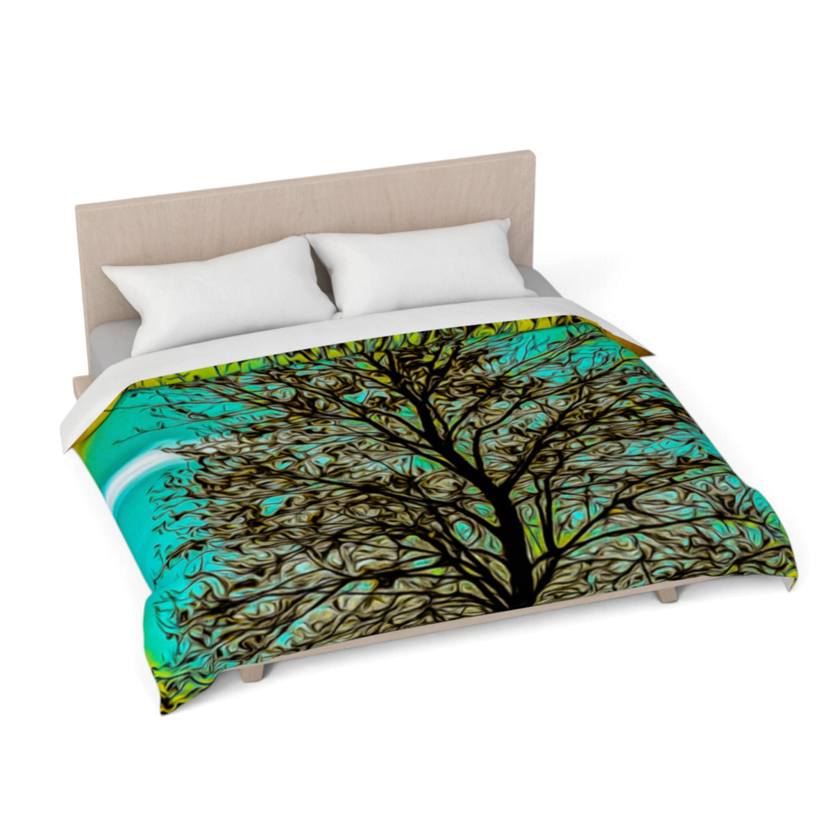 A bed dressed with a printed comforter featuring a stylized tree with dark brown branches over a bright turquoise and lime green background, shown with white pillows and a light wood headboard on a white studio background.