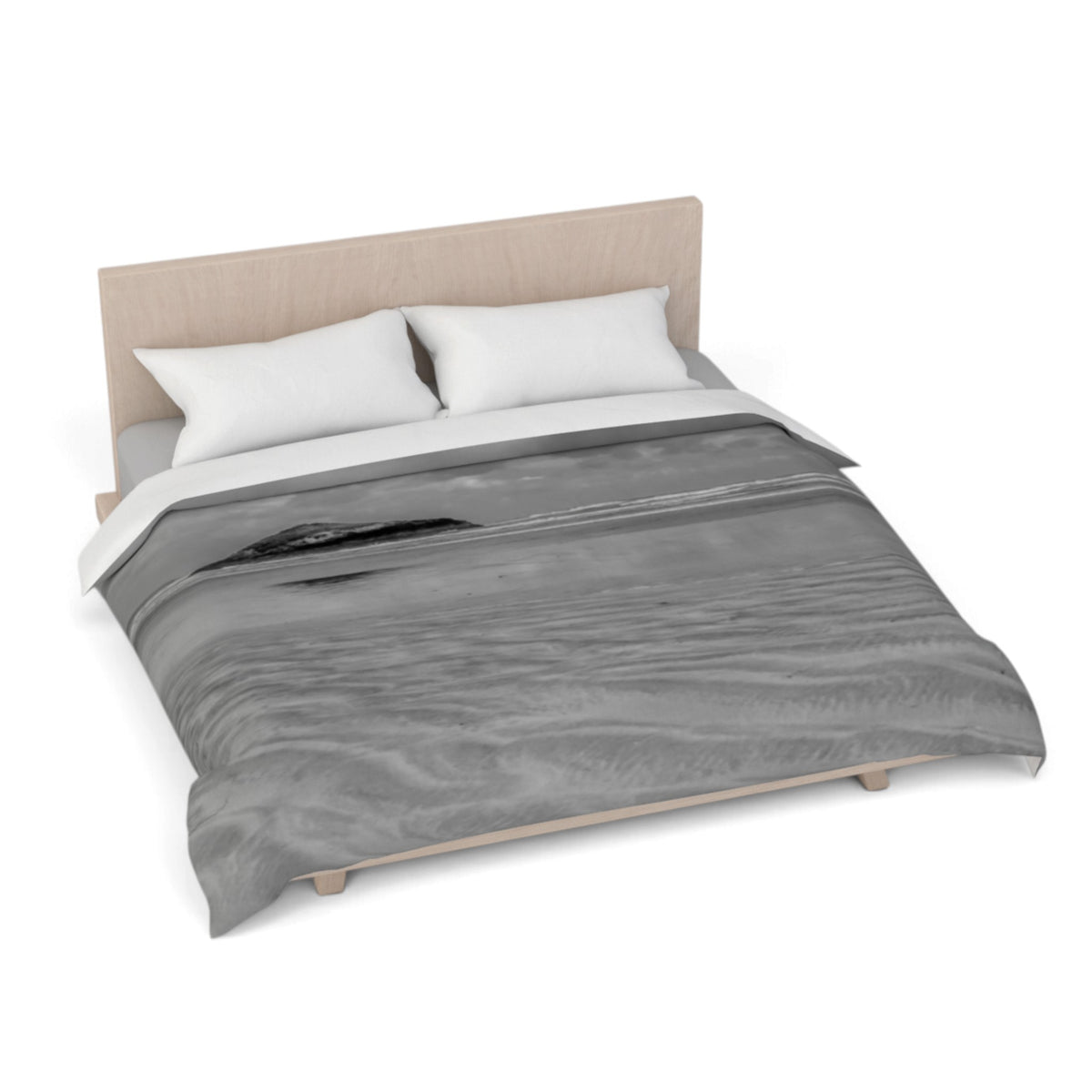 A bed dressed in a gray and white abstract patterned duvet cover with two white pillows and a light wood headboard, shown on a plain white background.