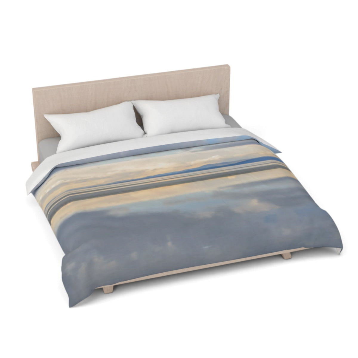 A bed dressed with a duvet cover featuring an abstract landscape-like pattern in muted blue, beige, gray, and cream tones, styled with two white pillows and a light wood headboard on a white background.