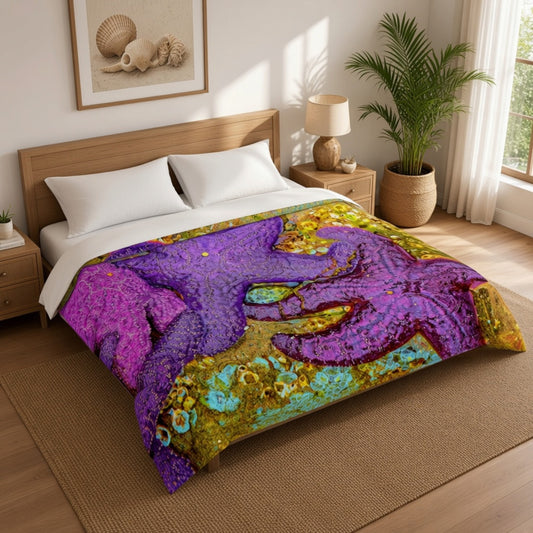 A bed dressed in a colorful printed comforter featuring a large purple octopus over a gold and turquoise background, styled in a bright bedroom with wood furniture, a plant, and natural light.