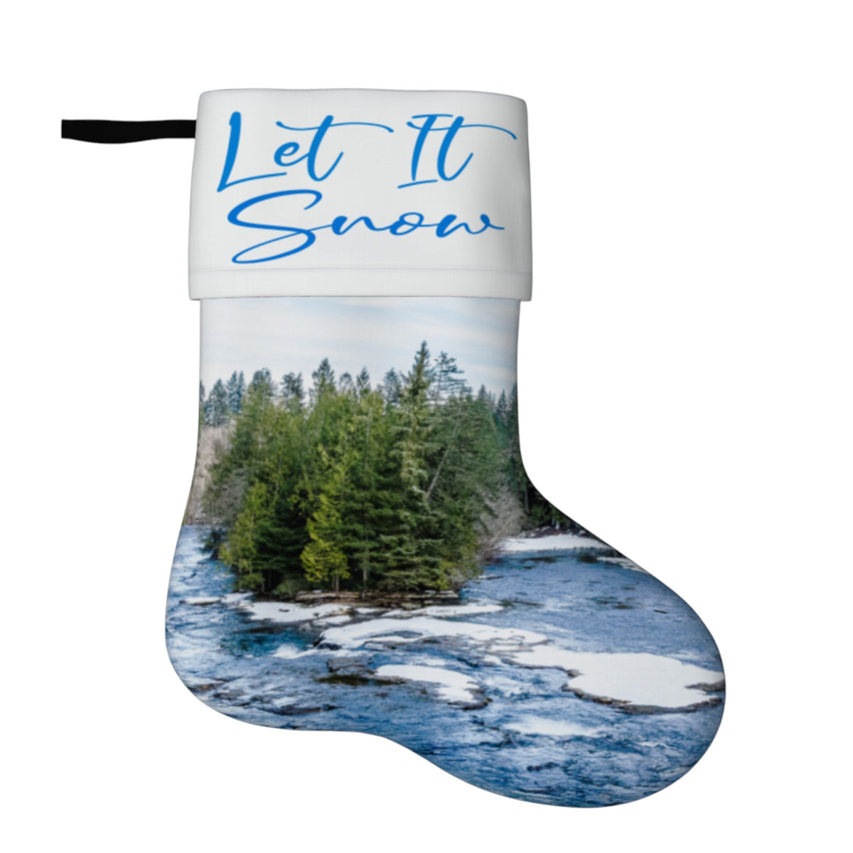 A Christmas stocking featuring a printed winter landscape with snow-covered rocks, evergreen trees, and blue sky, with the text 'Let It Snow' in blue script on a white cuff at the top.