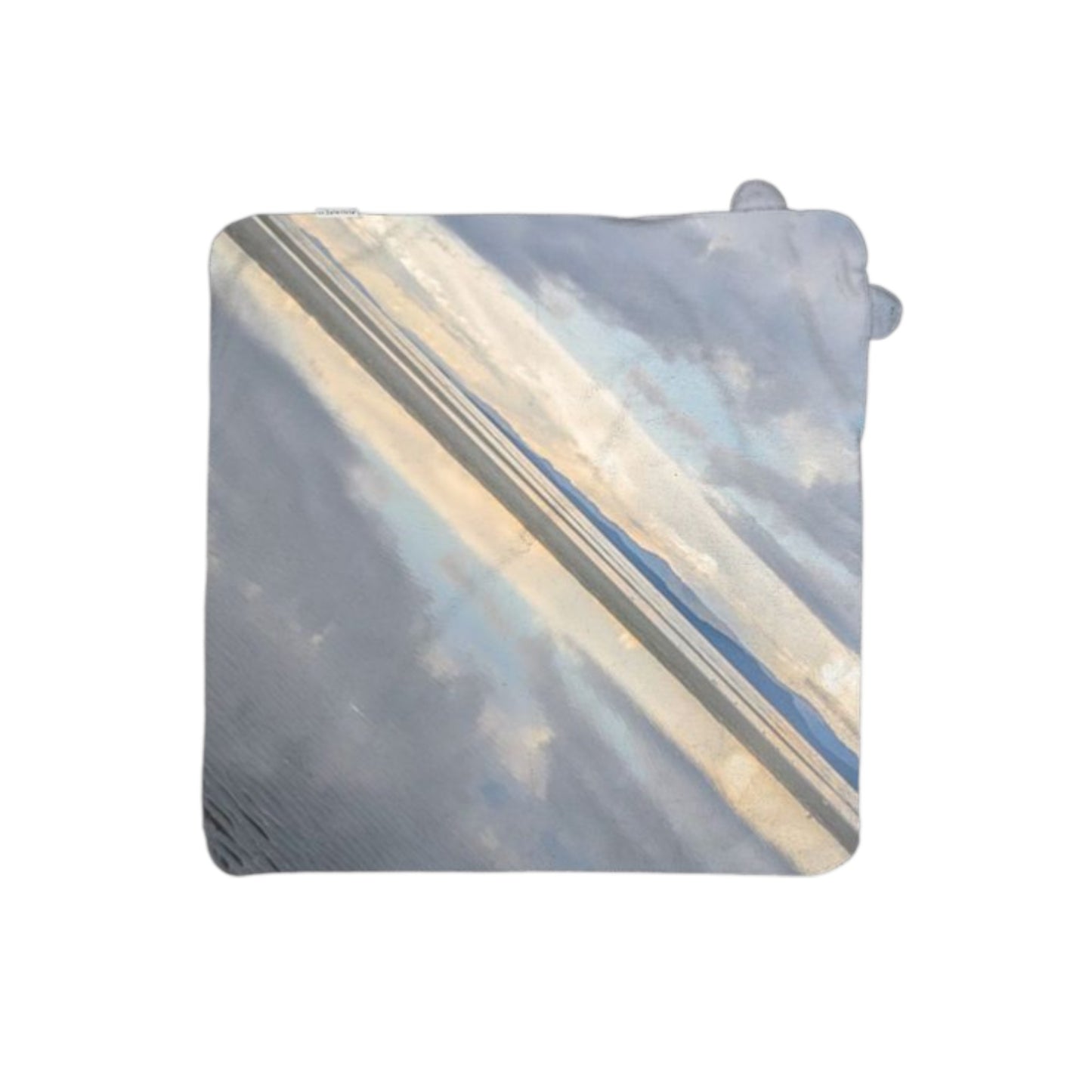 Rectangular object with a gradient design transitioning from blue to beige on a white background