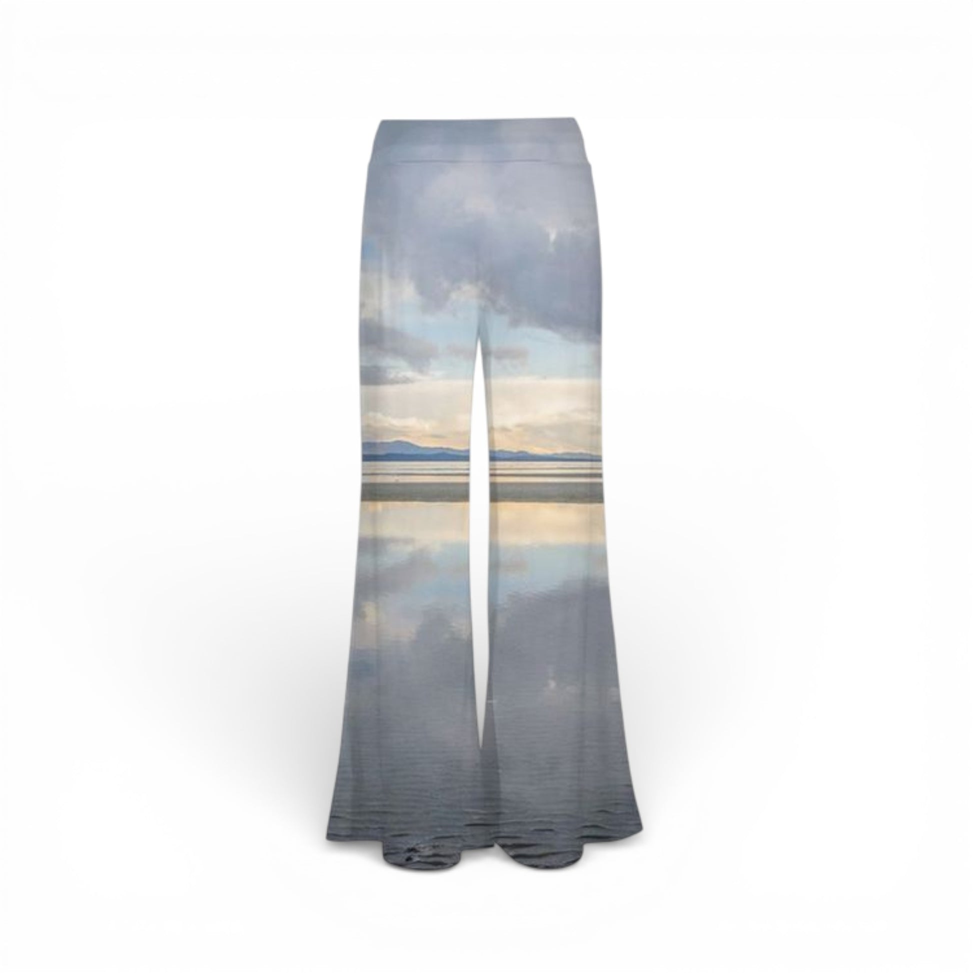 Flared pants with a scenic print on a white background
