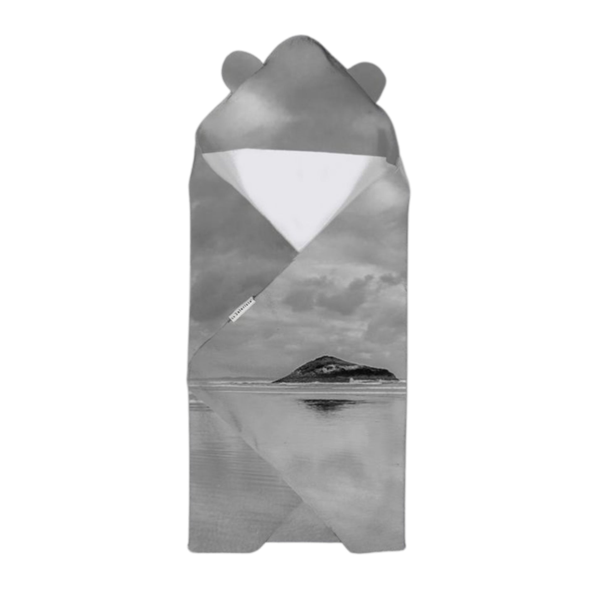 Hooded towel with bear ears featuring a mountain landscape design on a white background