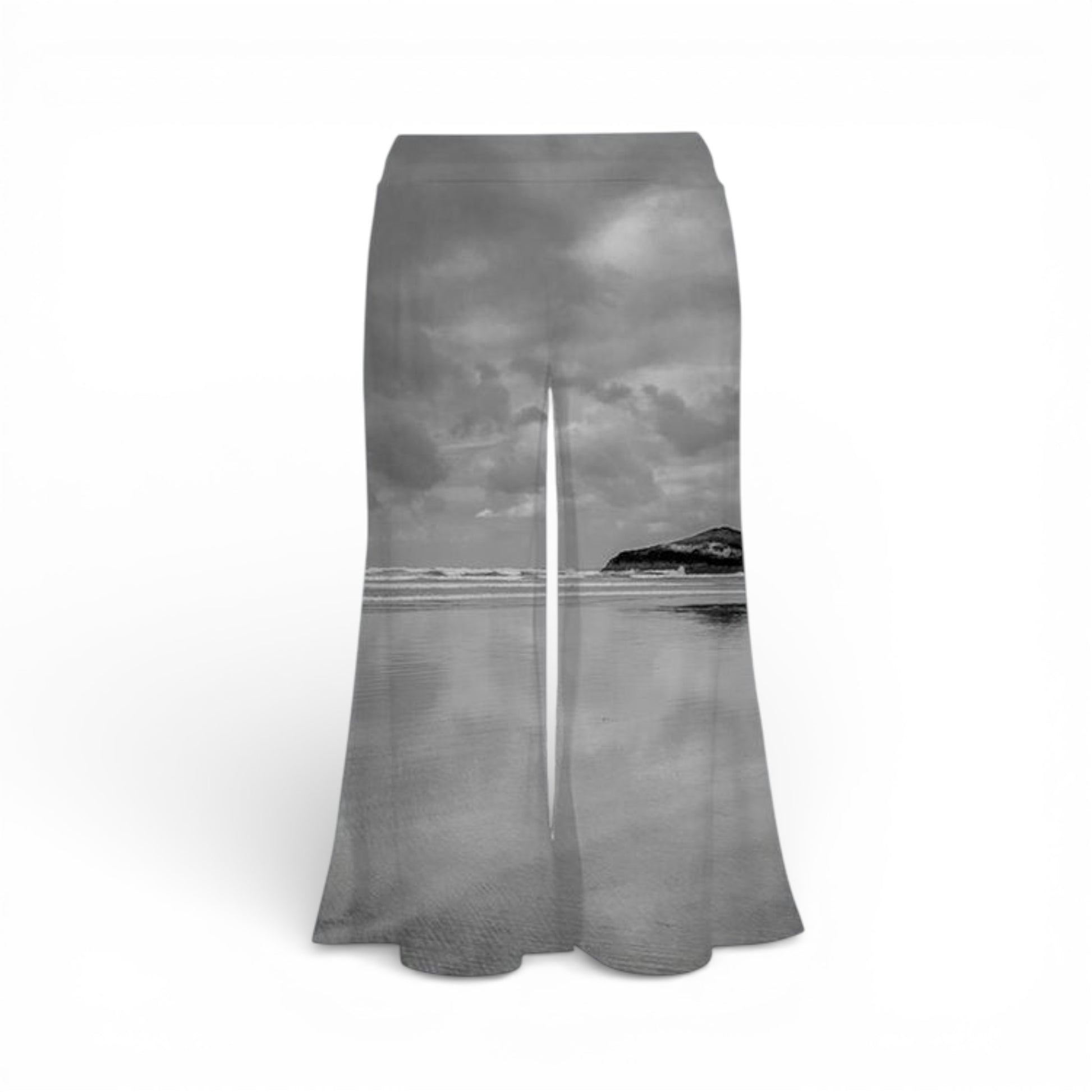 Skirt with a scenic print of a ocean and mountains on a white background