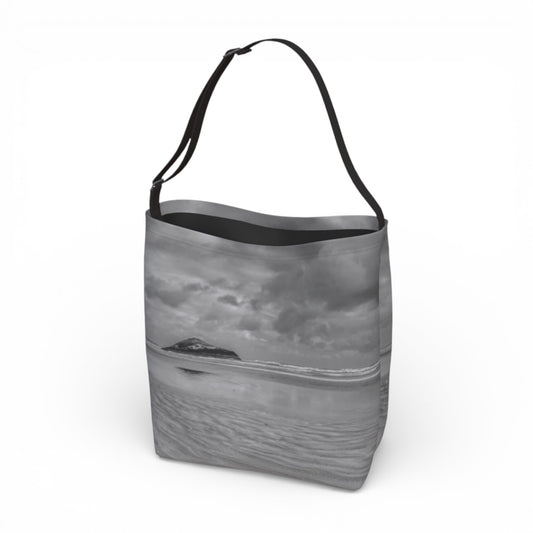 Tote bag with a black and white design on a white background