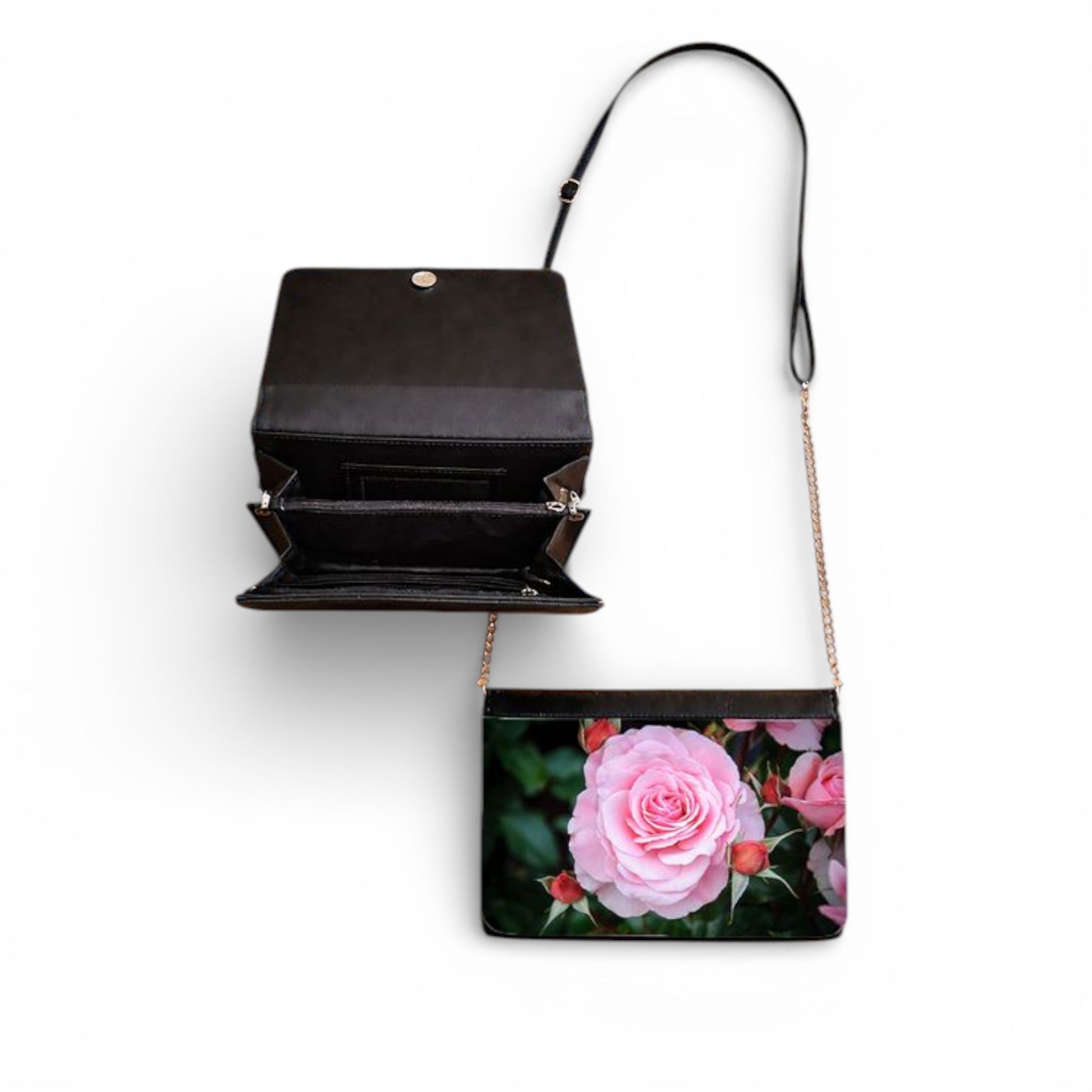 Black handbag with floral design on a white background