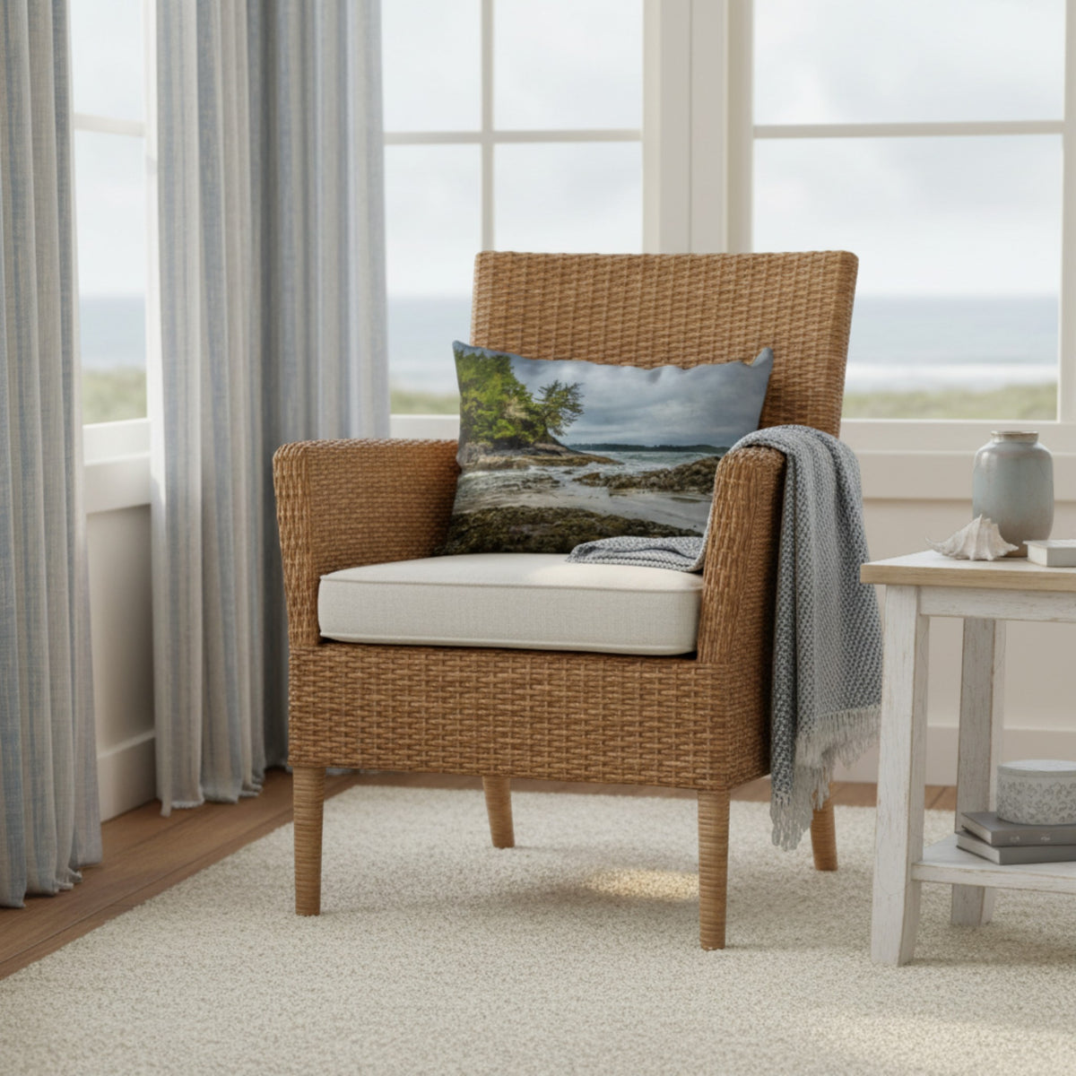 A throw pillow cover featuring an image of a coastal scene with rocks and trees on a beach.