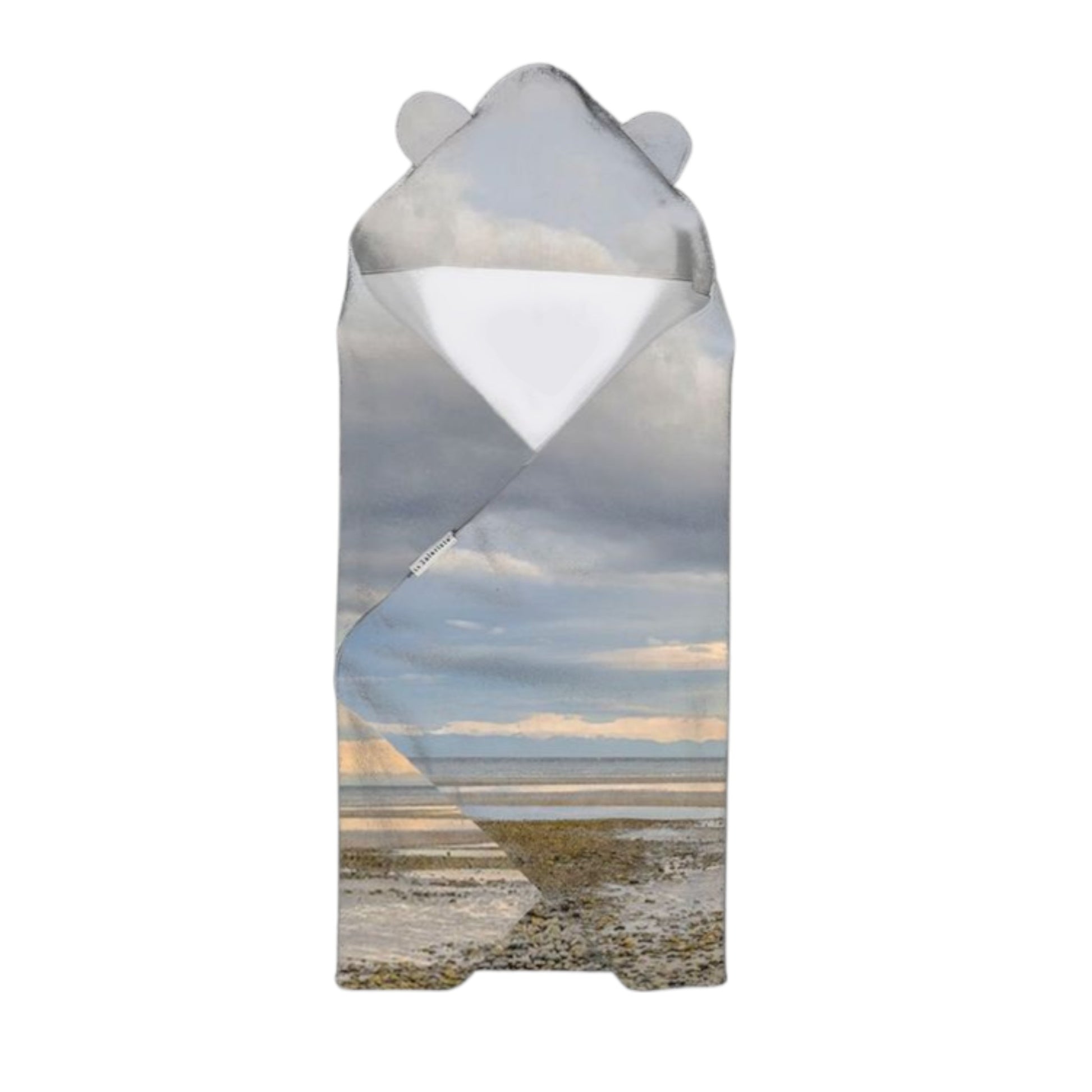 Hooded towel with a scenic print of a beach and sky on a white background