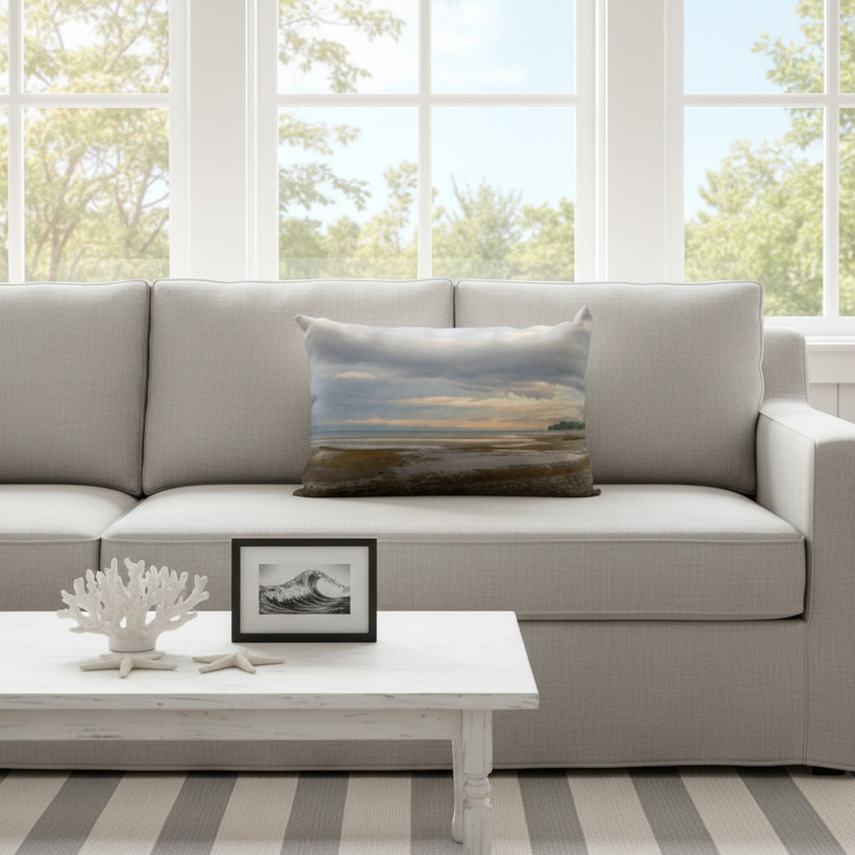 A throw pillow with an image of a serene beach scene on Vancouver Island's west coast.