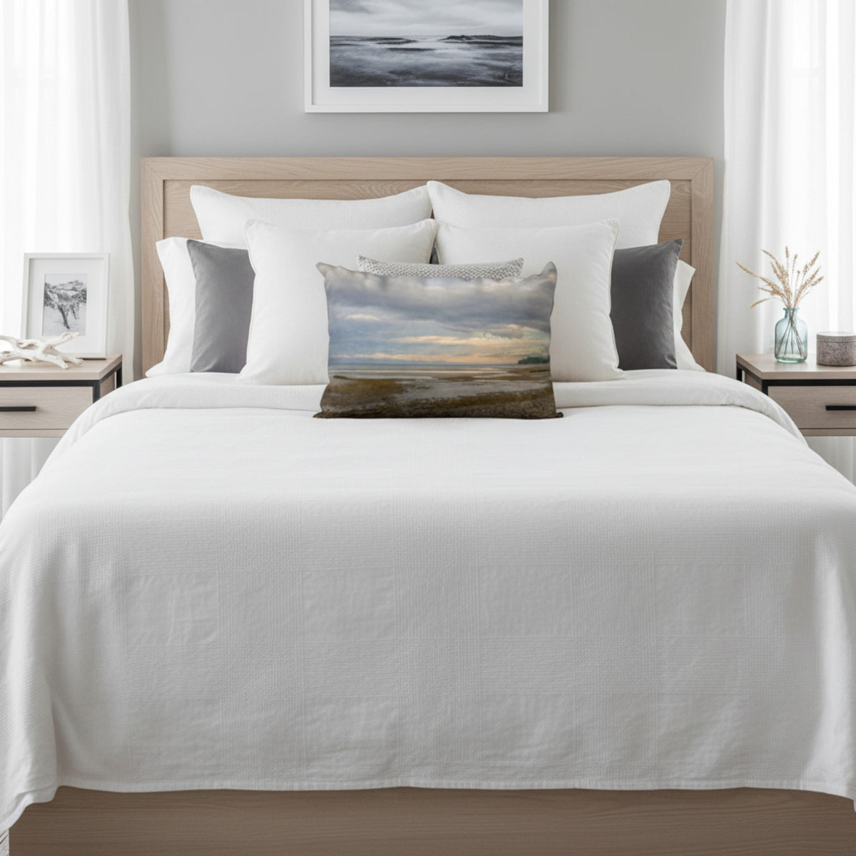 A throw pillow with an image of a serene beach scene on Vancouver Island's west coast.