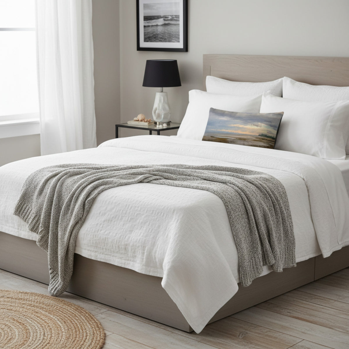 A throw pillow with an image of a serene beach scene on Vancouver Island's west coast.