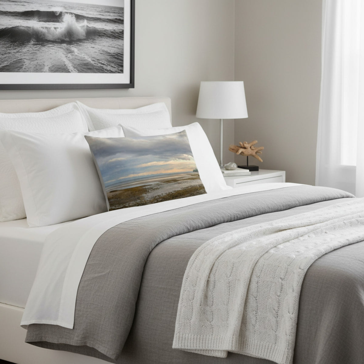 A throw pillow with an image of a serene beach scene on Vancouver Island's west coast.