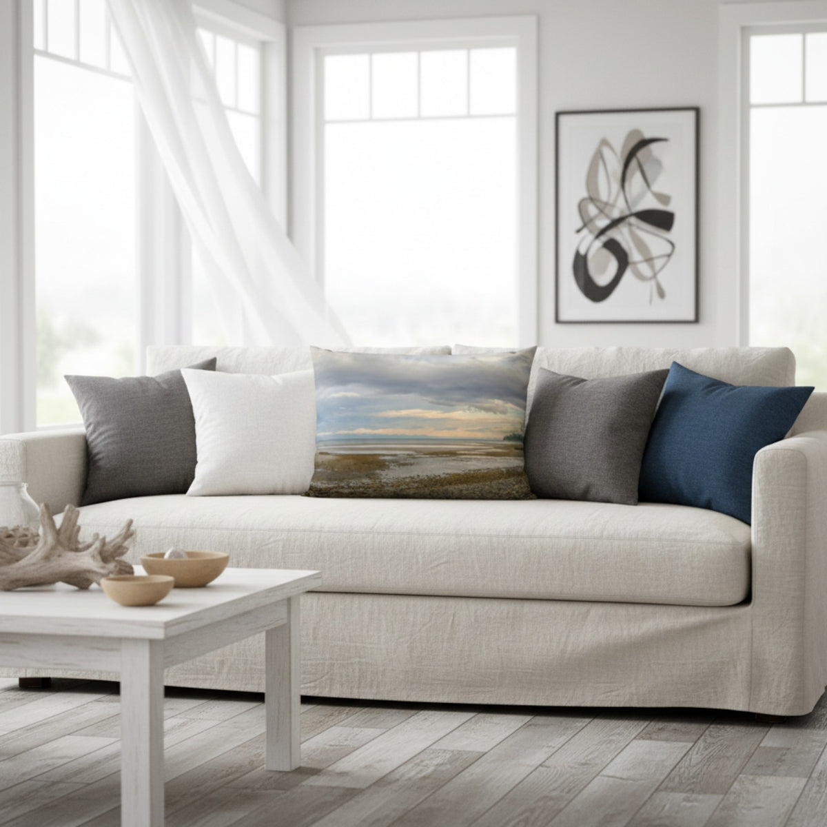 A throw pillow with an image of a serene beach scene on Vancouver Island's west coast.