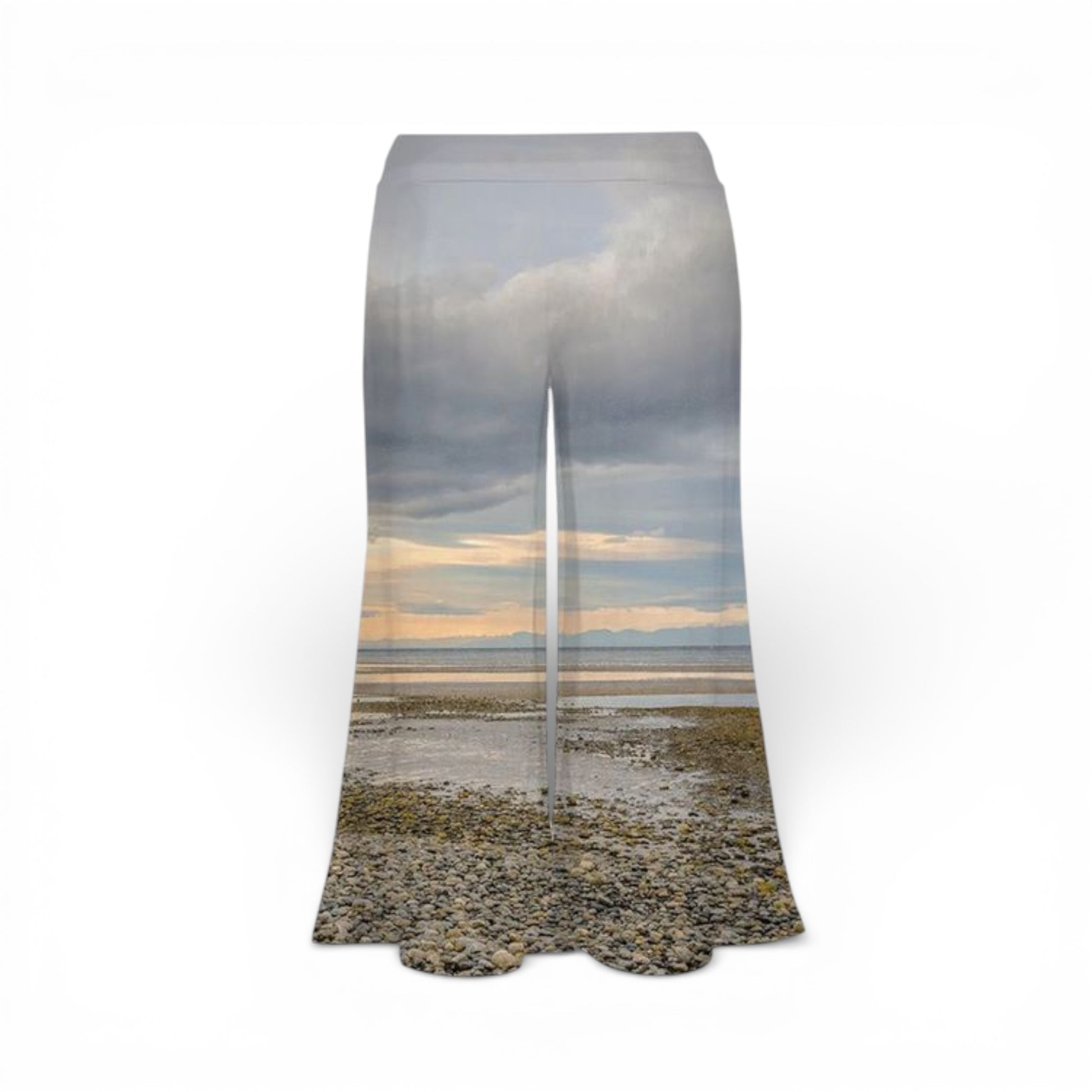 Pants with a beach and sky design on a white background