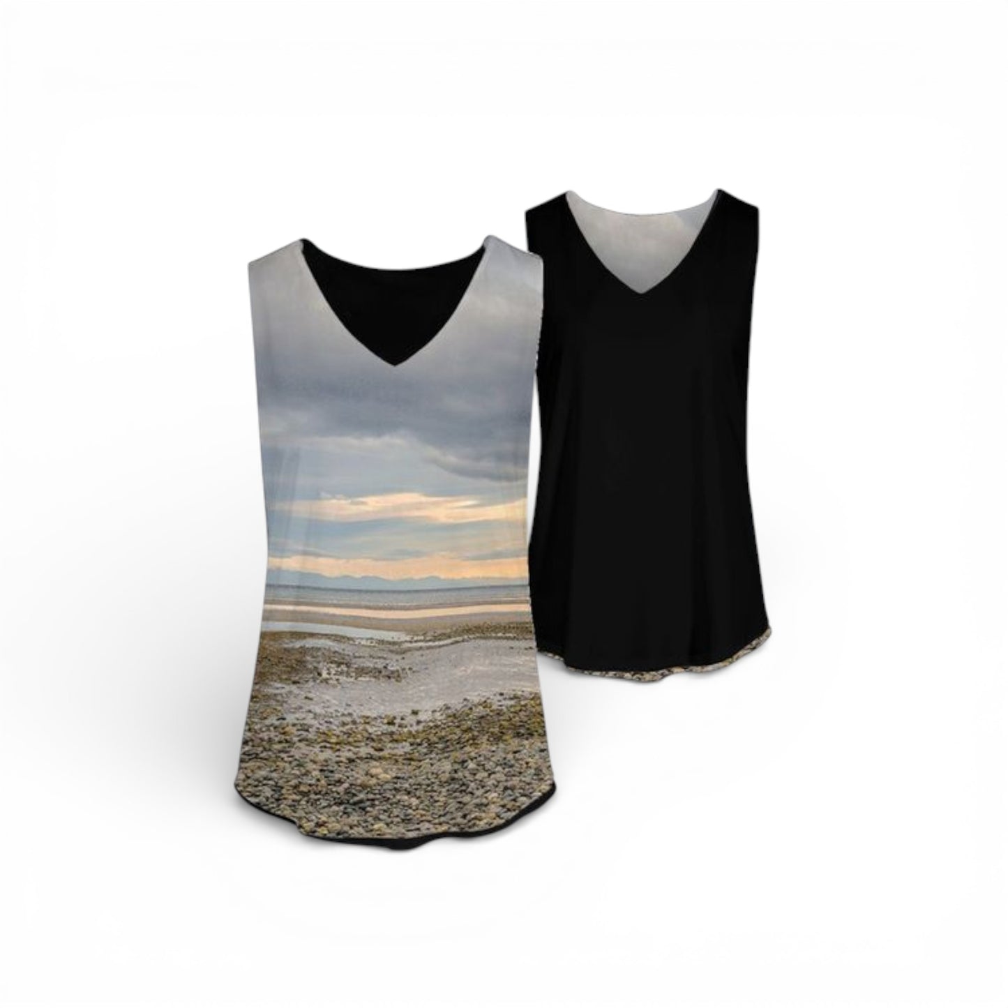 Two tank tops, one with a beachscape design and the other black, on a white background.