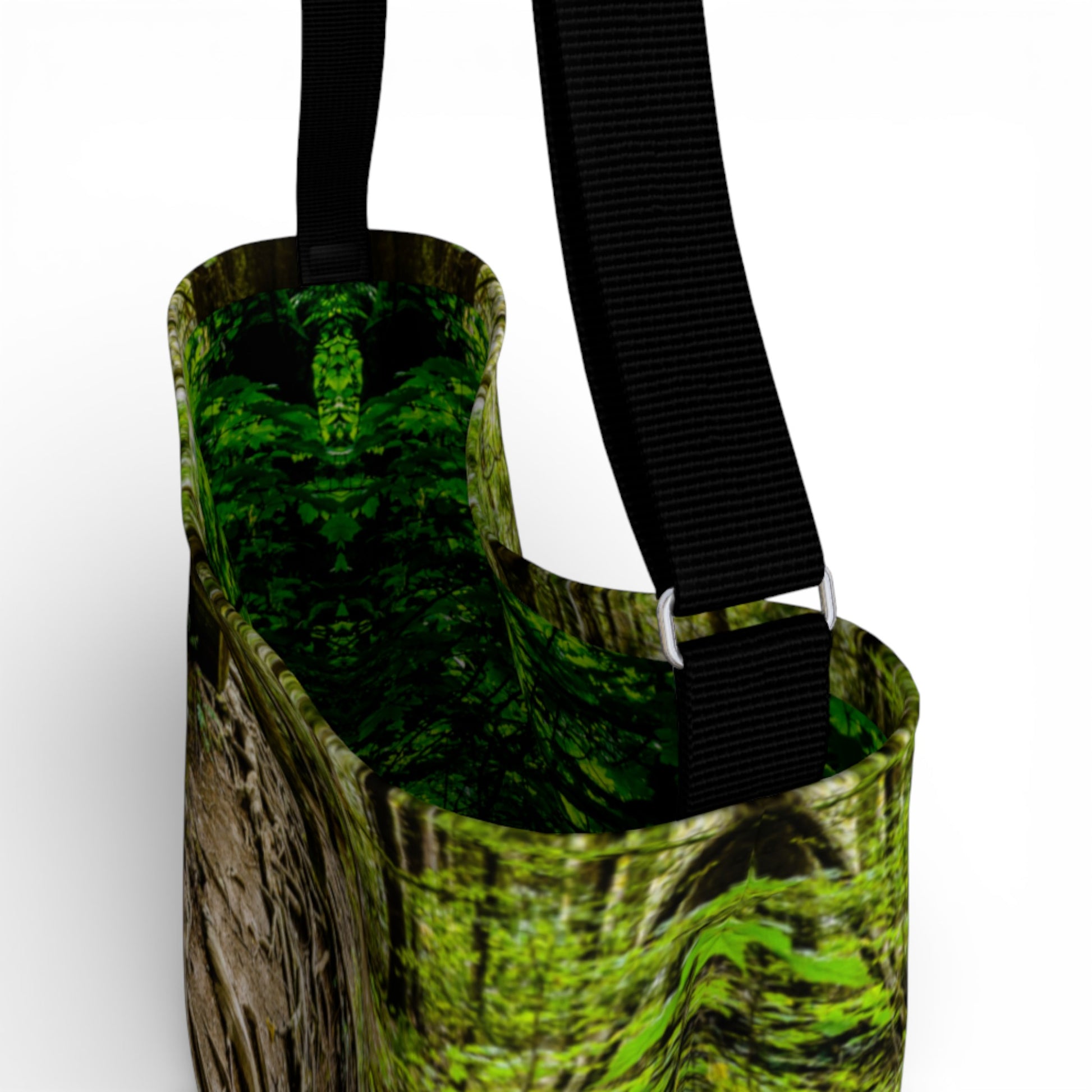 Green camouflage-patterned bag with a black strap on a white background